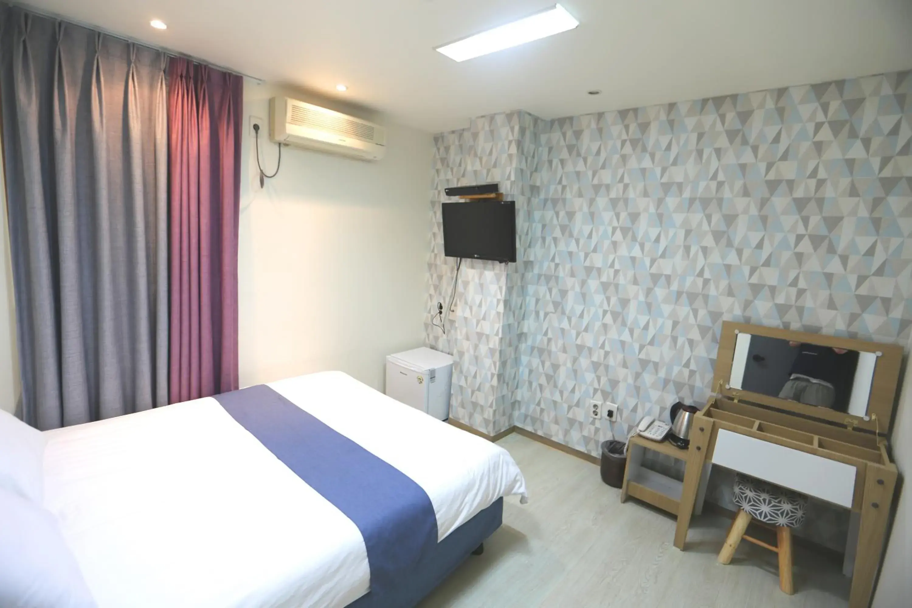 Bedroom, TV/Entertainment Center in MUST STAY HOTEL Myeongdong