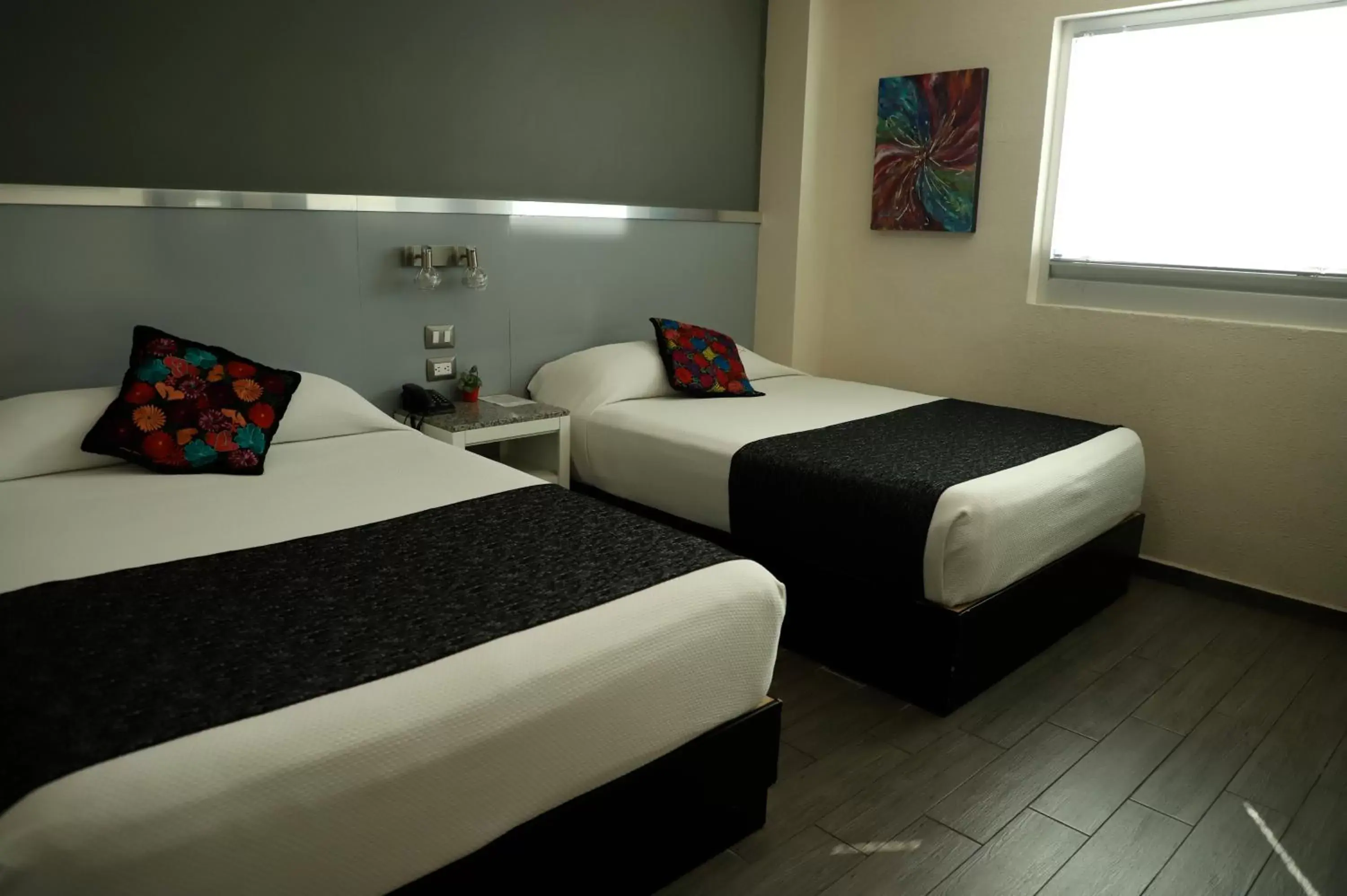 Bed in Homesuites Rotarismo