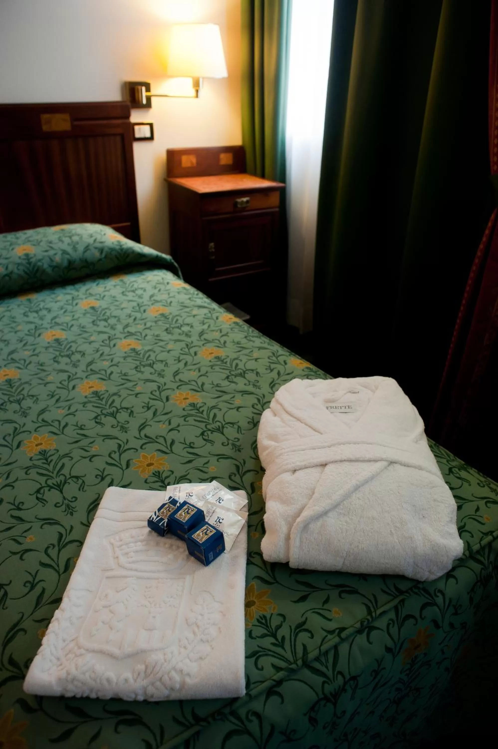 Bed in Hotel Candiani