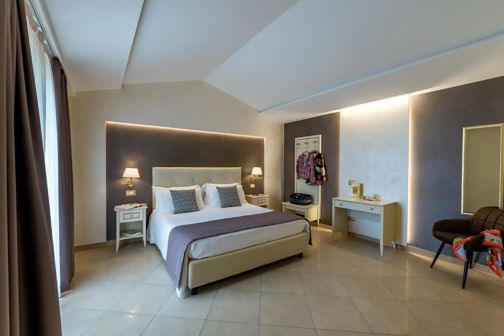 Bed in Vittorio Emanuele Boutique Hotel