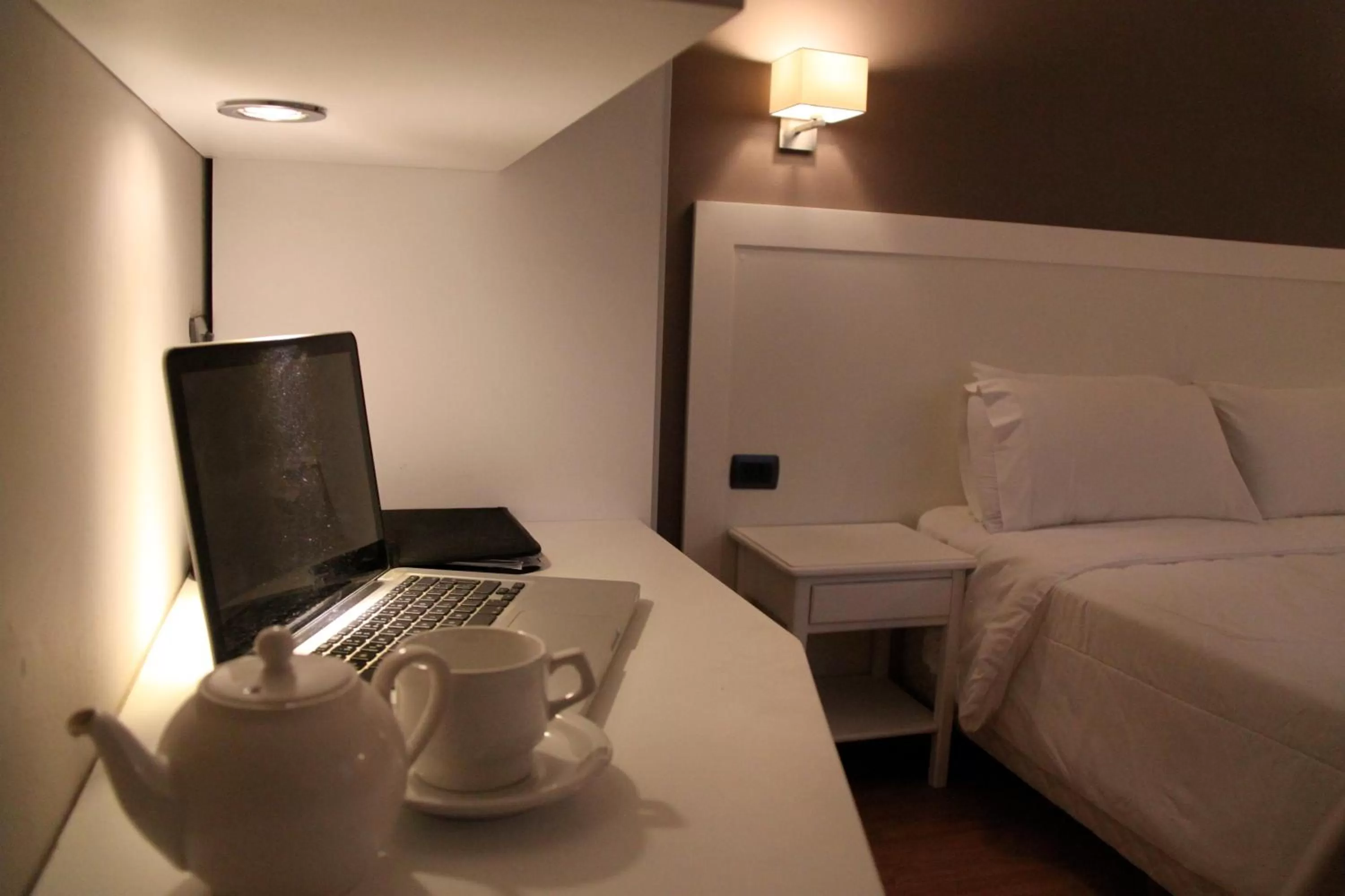 Seating area, Bed in Hotel Milano