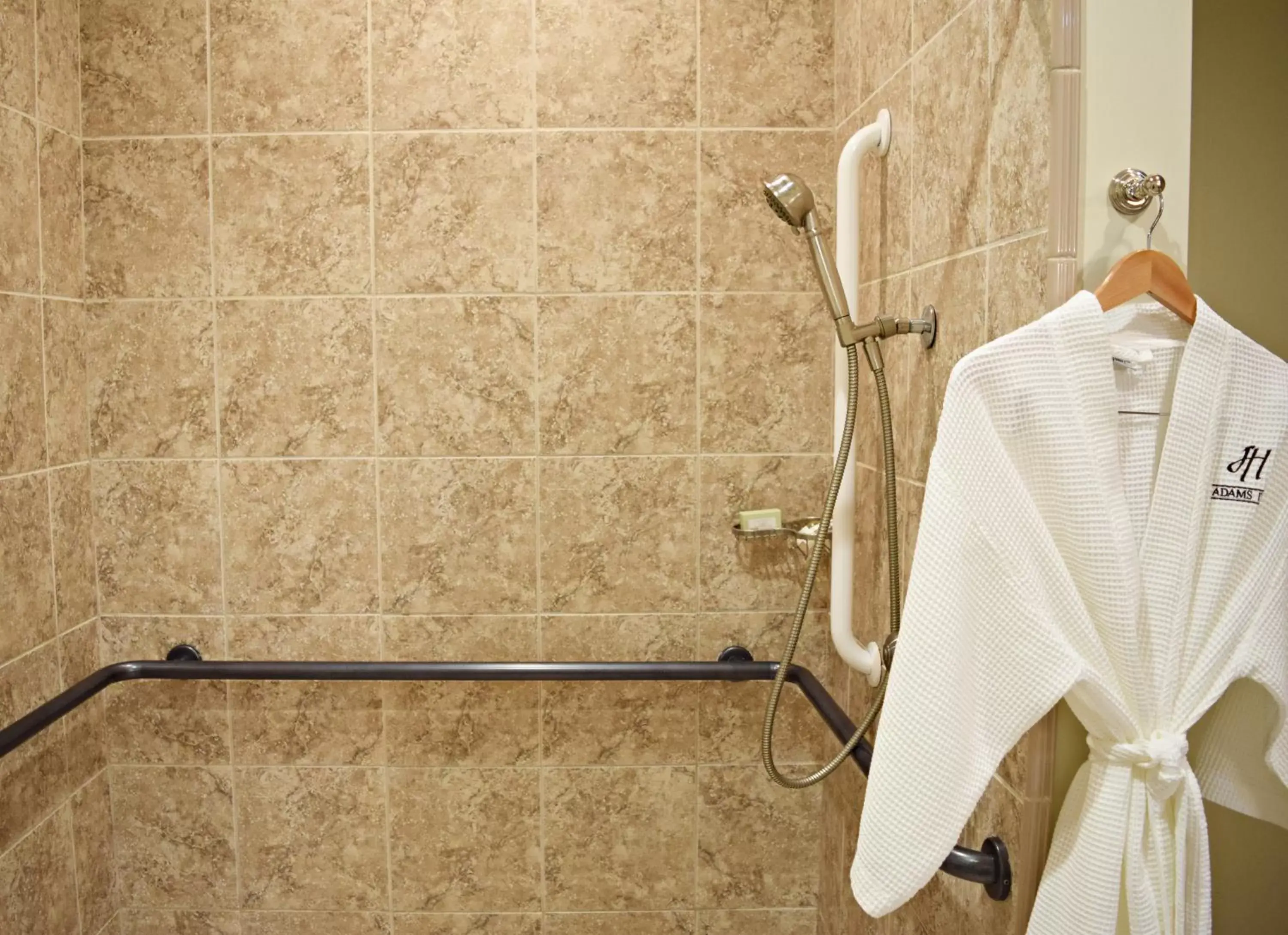 Shower, Bathroom in JH Adams Inn, Trademark Collection by Wyndham