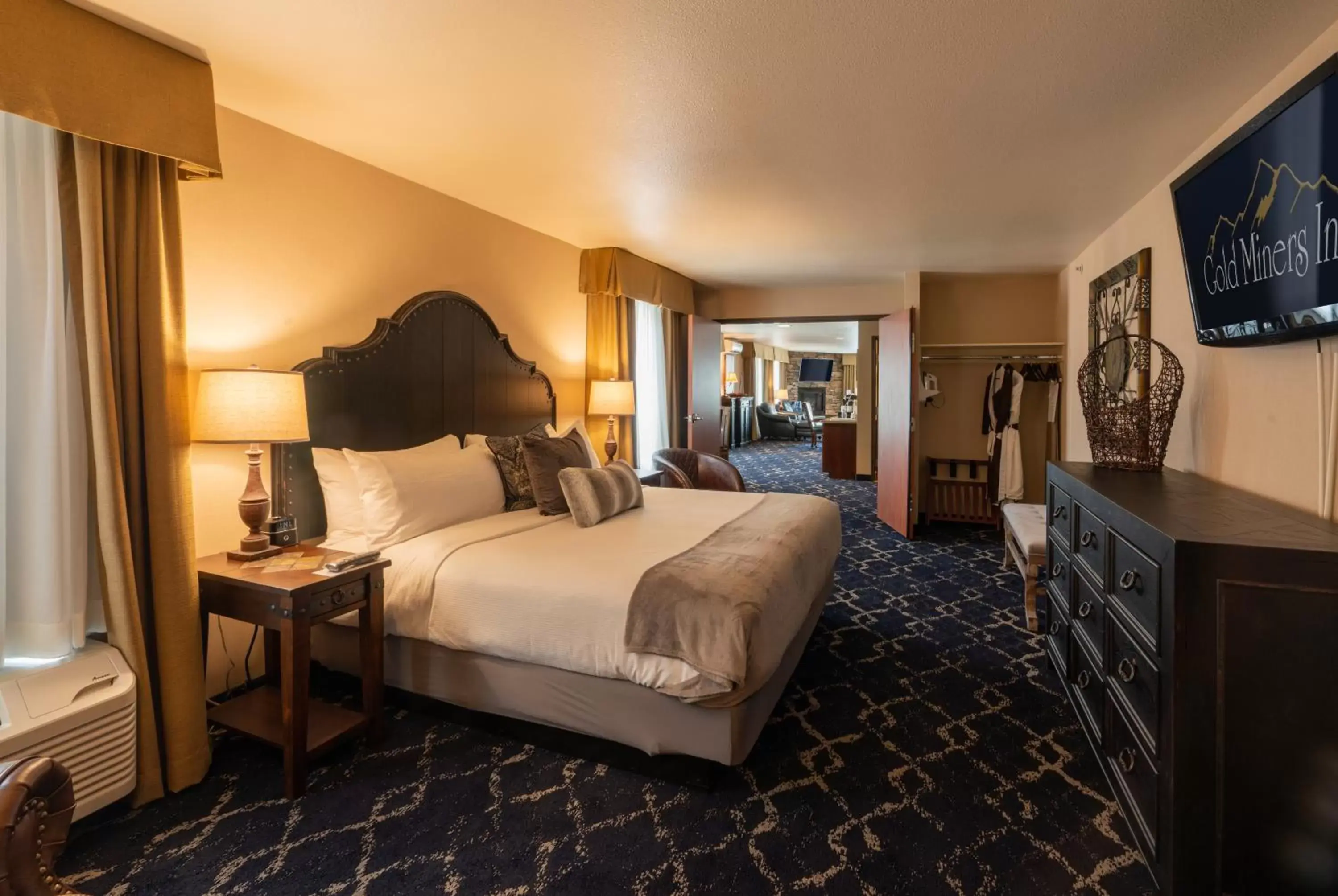 Bedroom in Gold Miners Inn, Ascend Hotel Collection