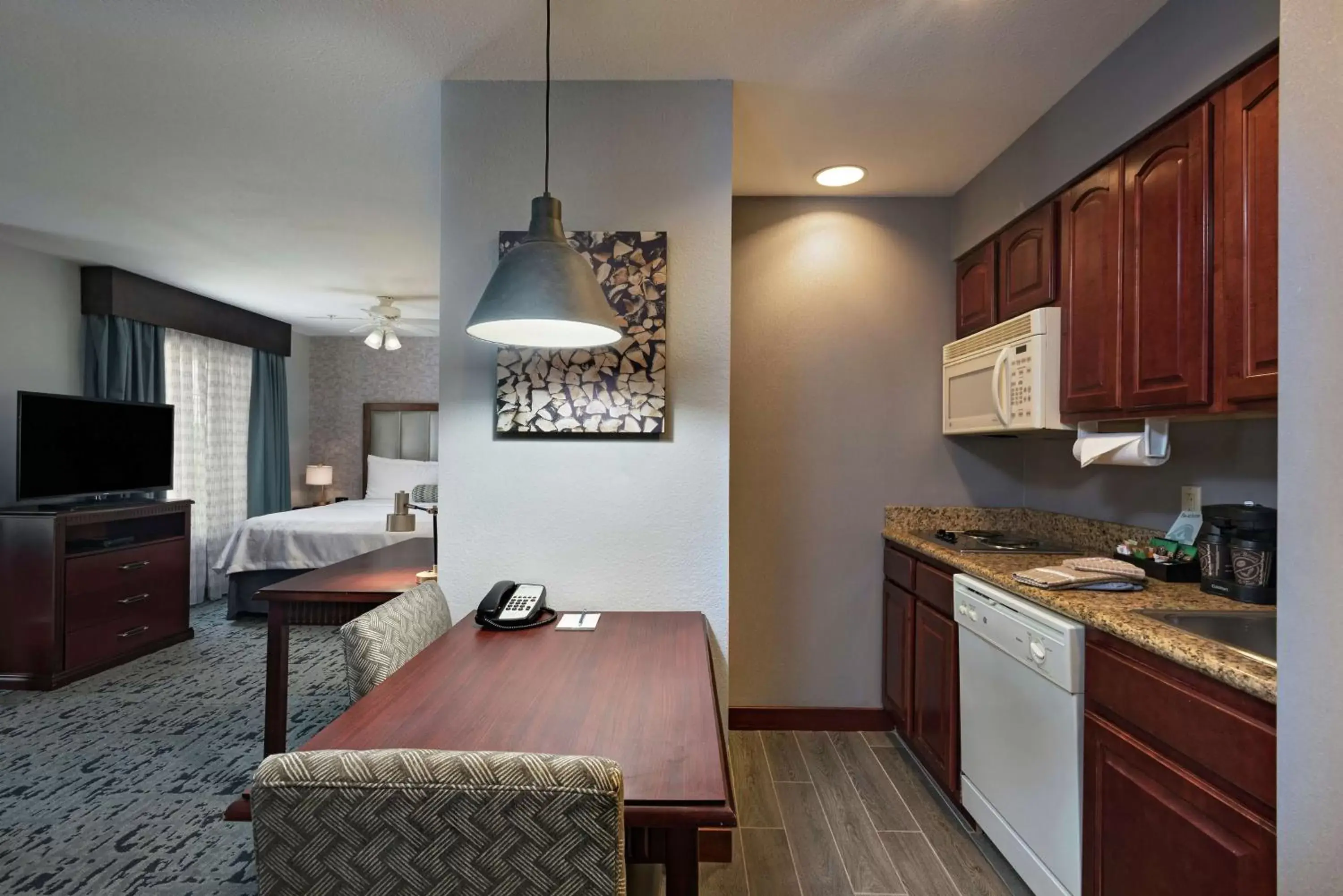Bedroom, Kitchen/Kitchenette in Homewood Suites by Hilton Fort Collins