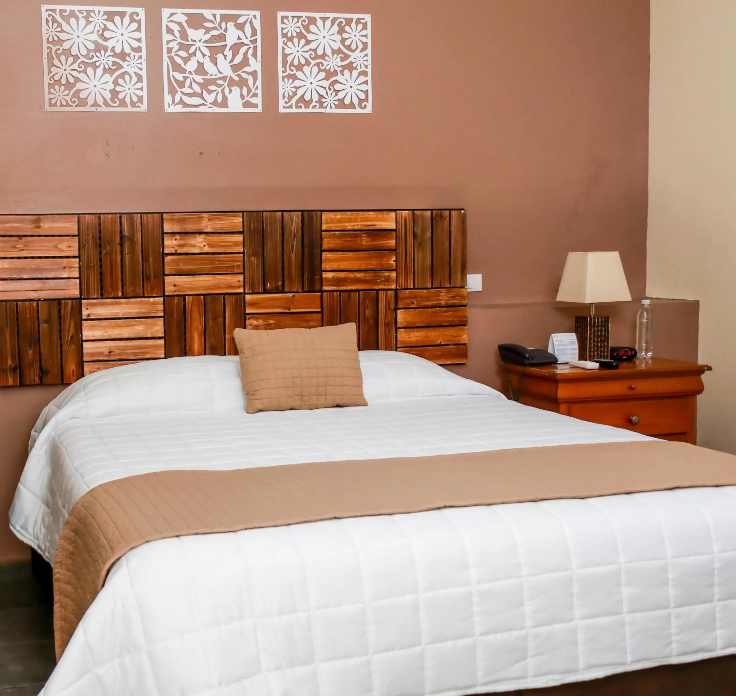 Bed in Las Magnolias Hotel Boutique