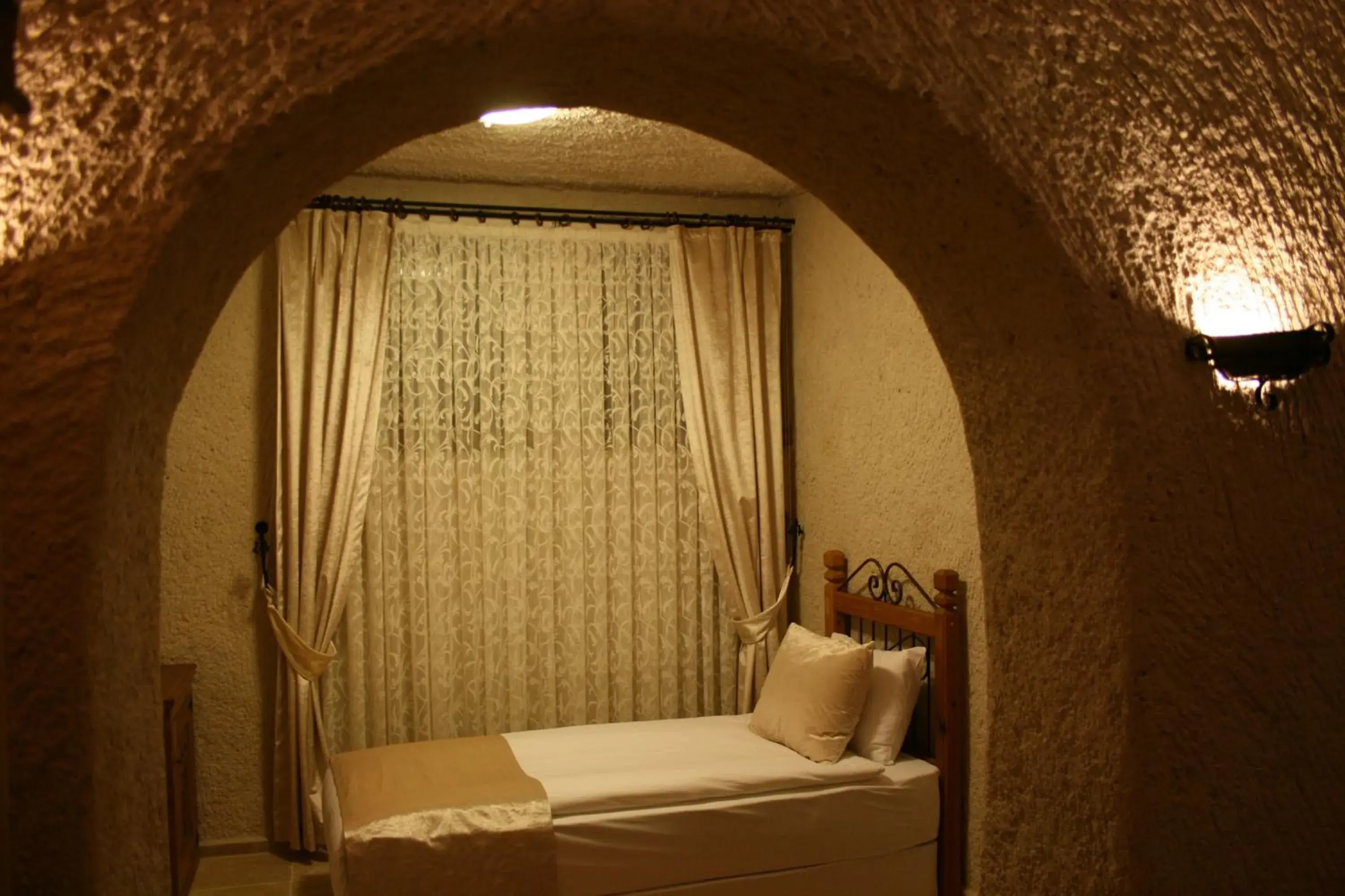 Bed, Seating Area in Goreme Inn Hotel
