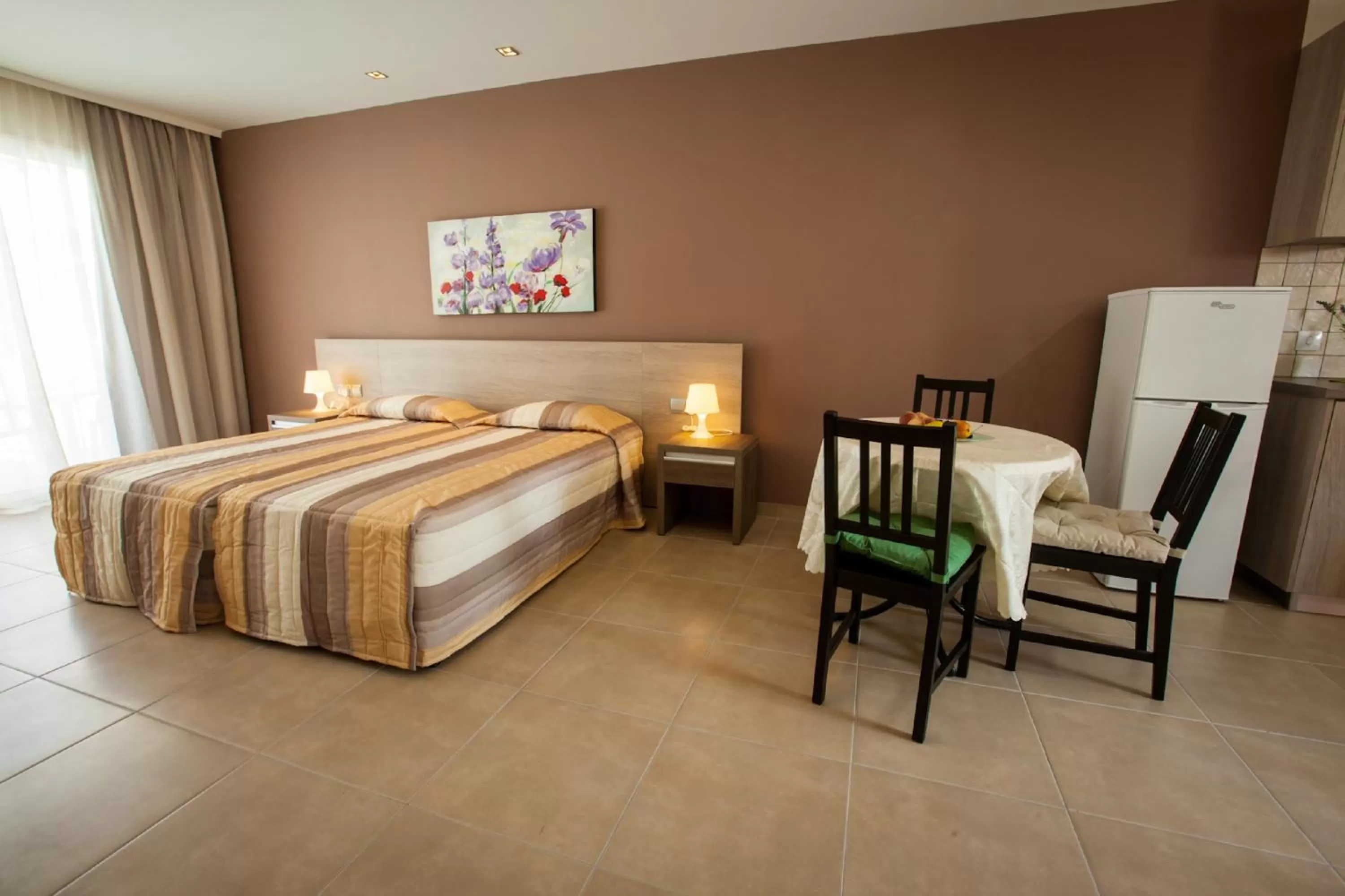 Bed in Crystallo Apartments