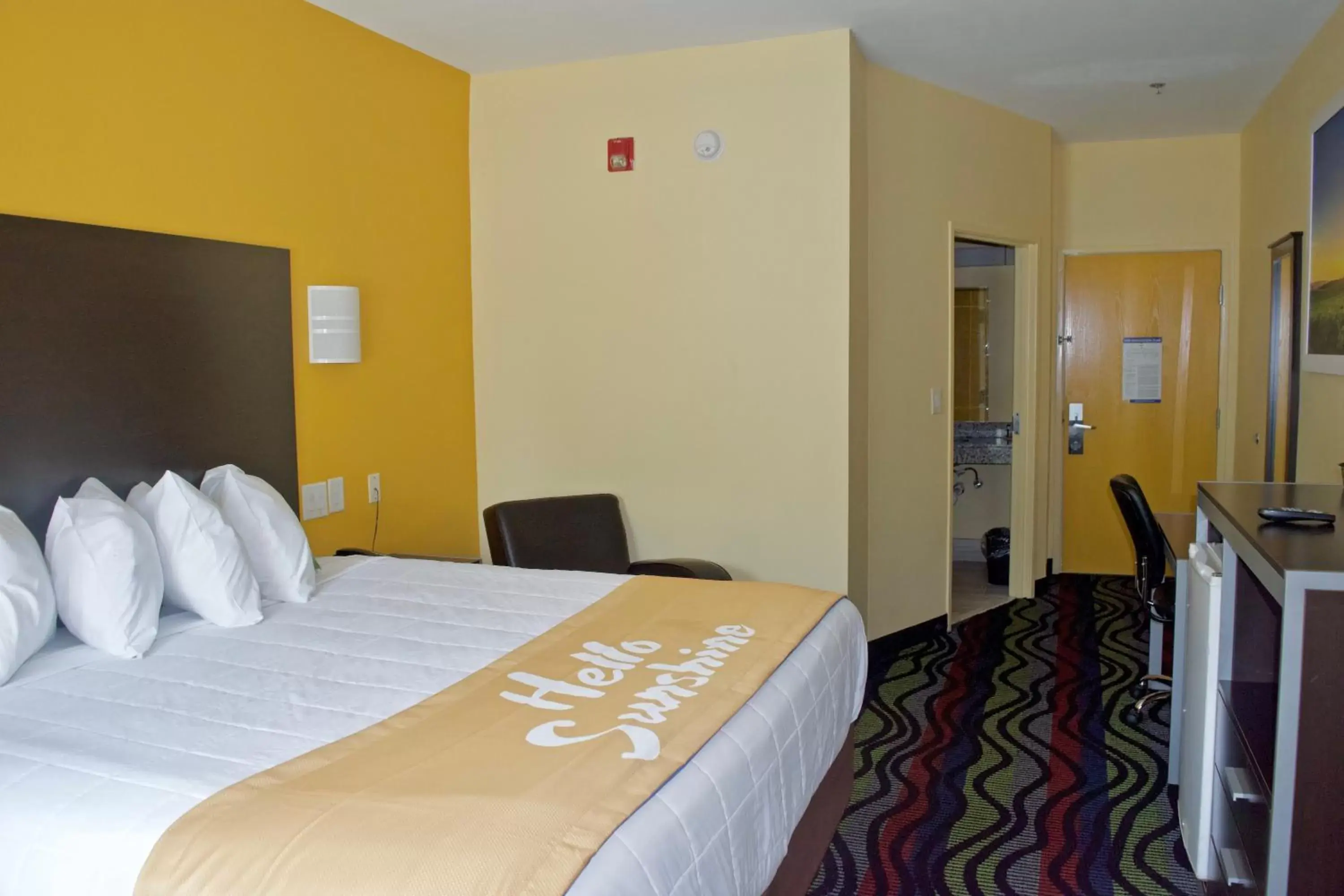 Photo of the whole room, Bed in Days Inn & Suites by Wyndham Augusta Near Fort Gordon