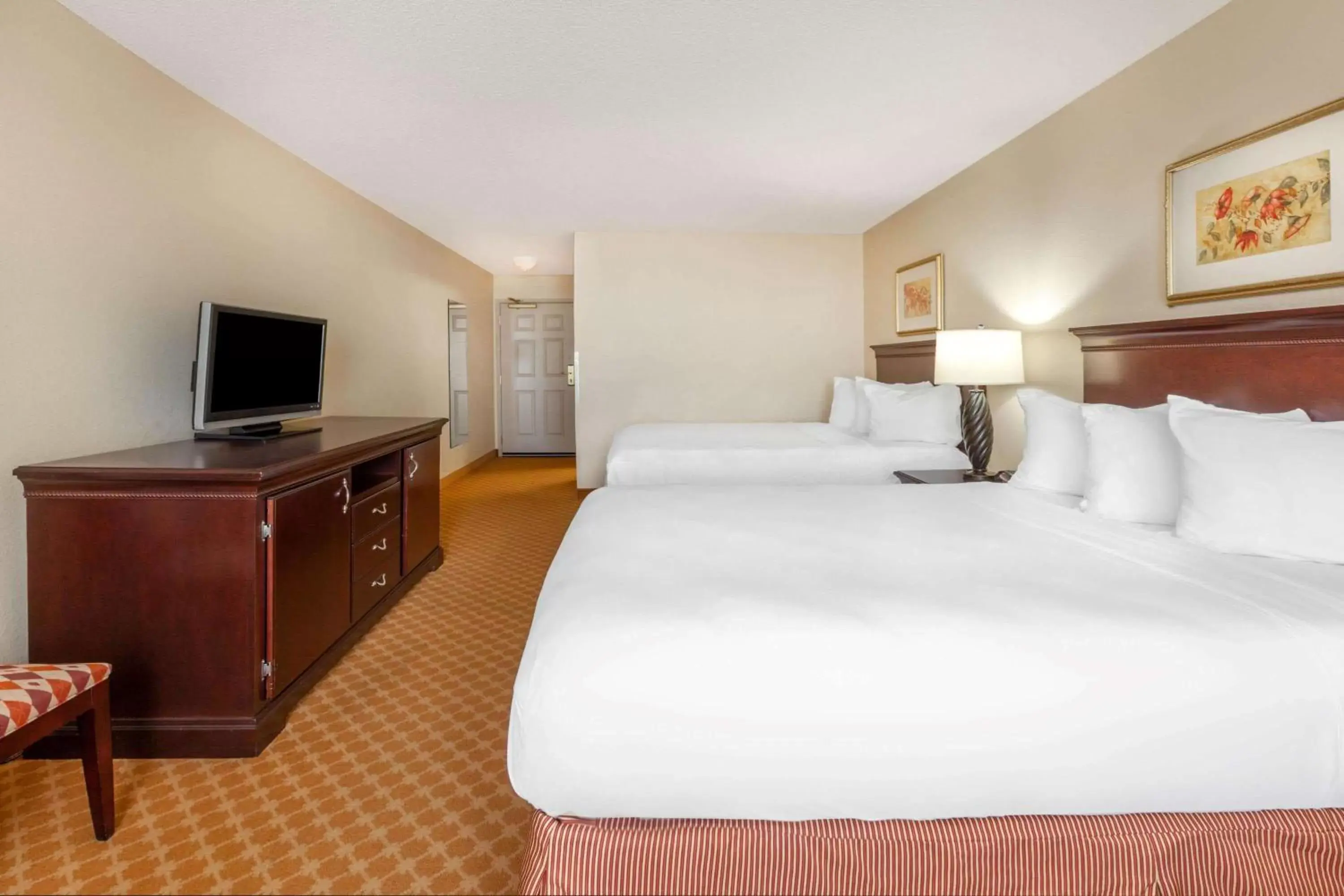 Photo of the whole room, Bed in AmericInn by Wyndham Iron Mountain