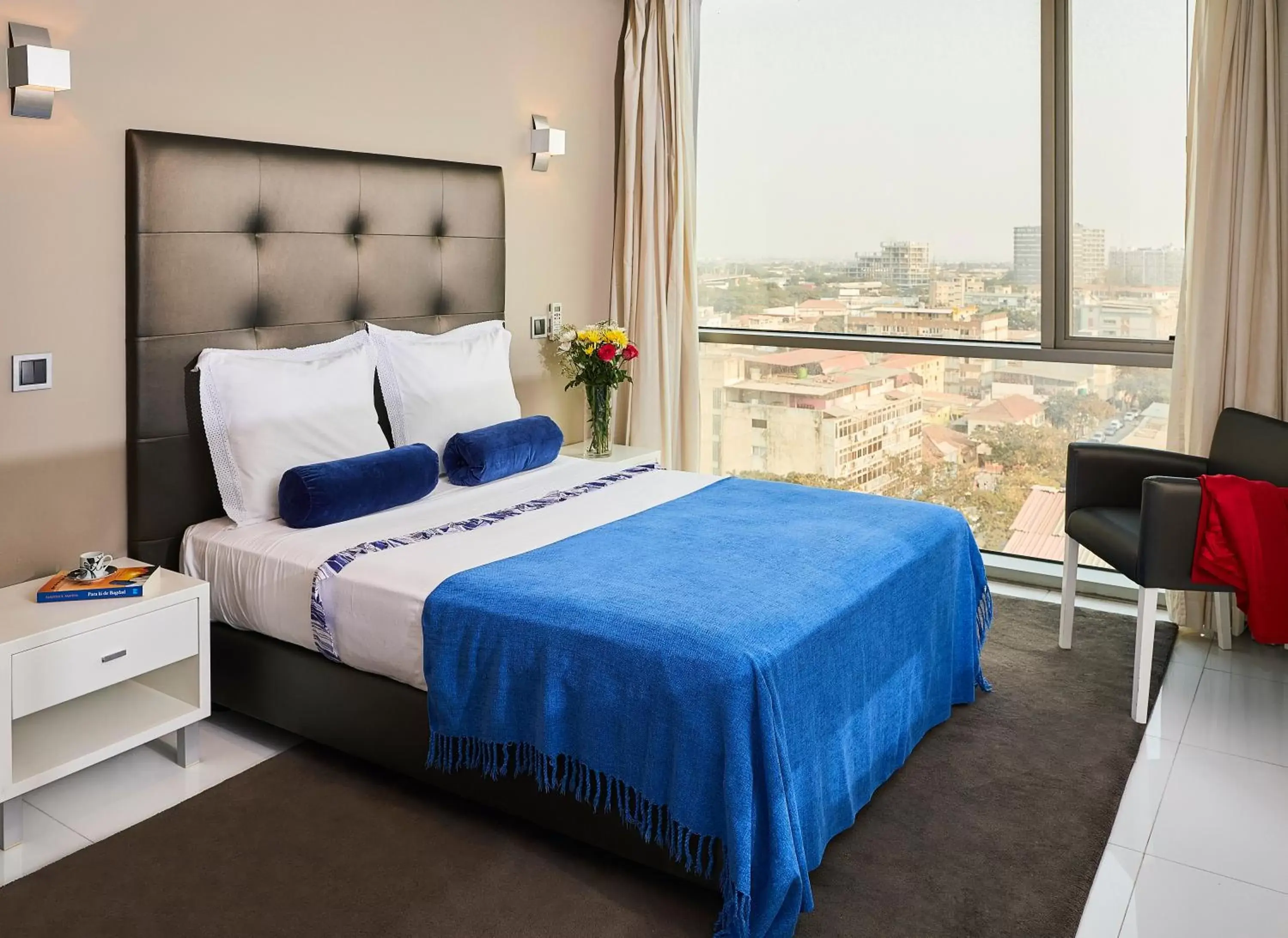 Bed in RK Suite Hotel
