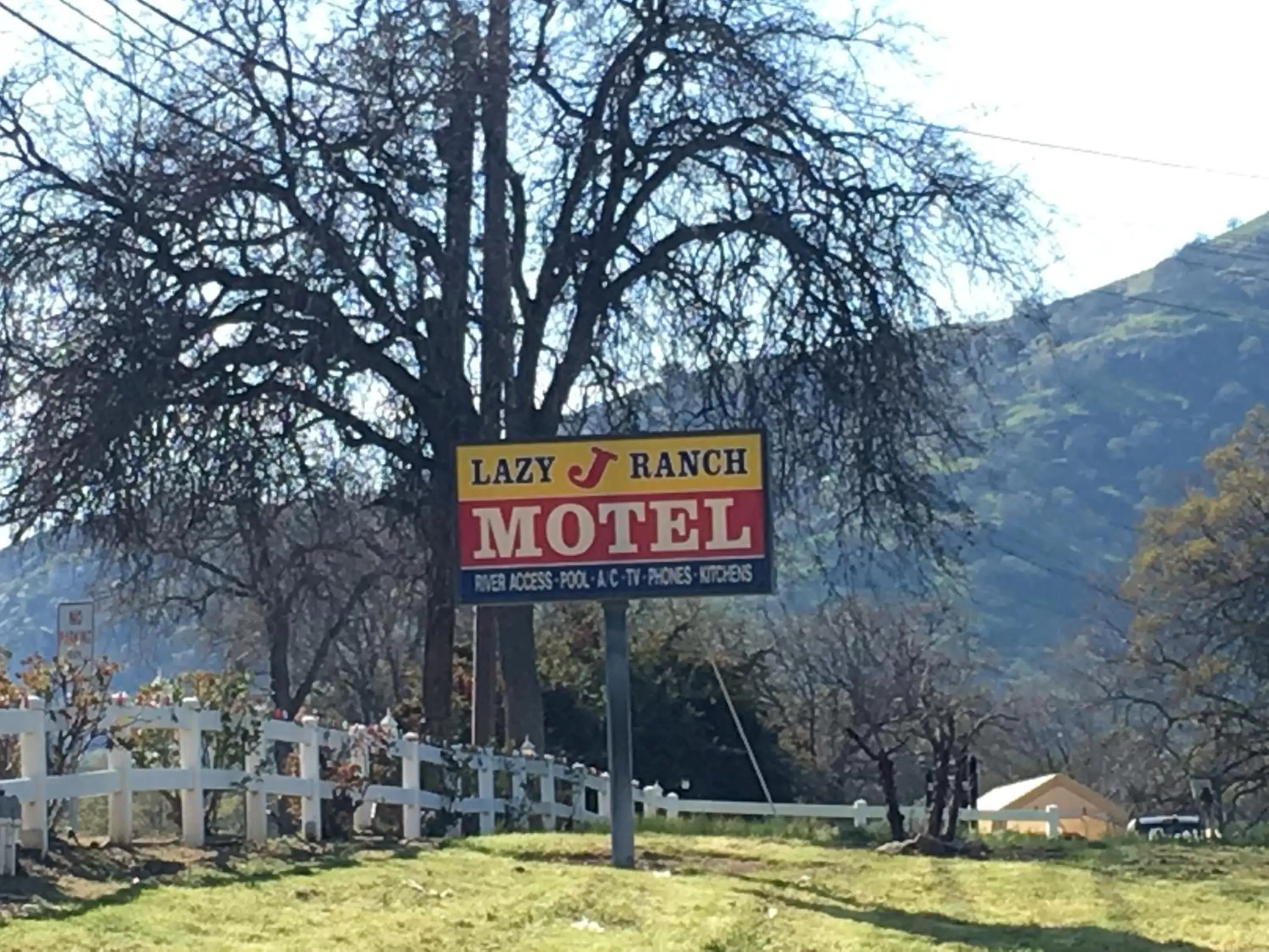 Property logo or sign in Lazy J Ranch Motel