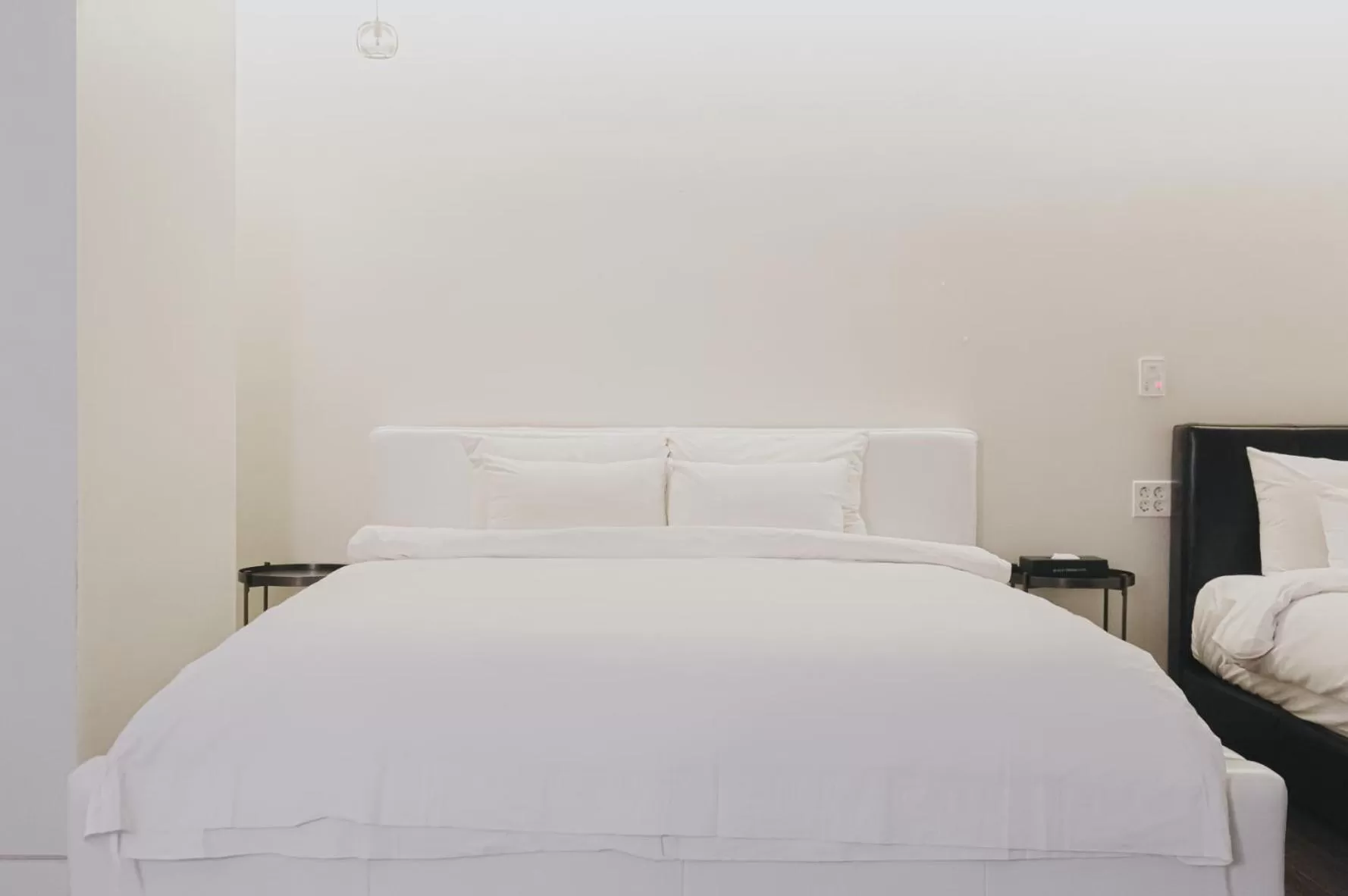 Bed in ACC Design Hotel