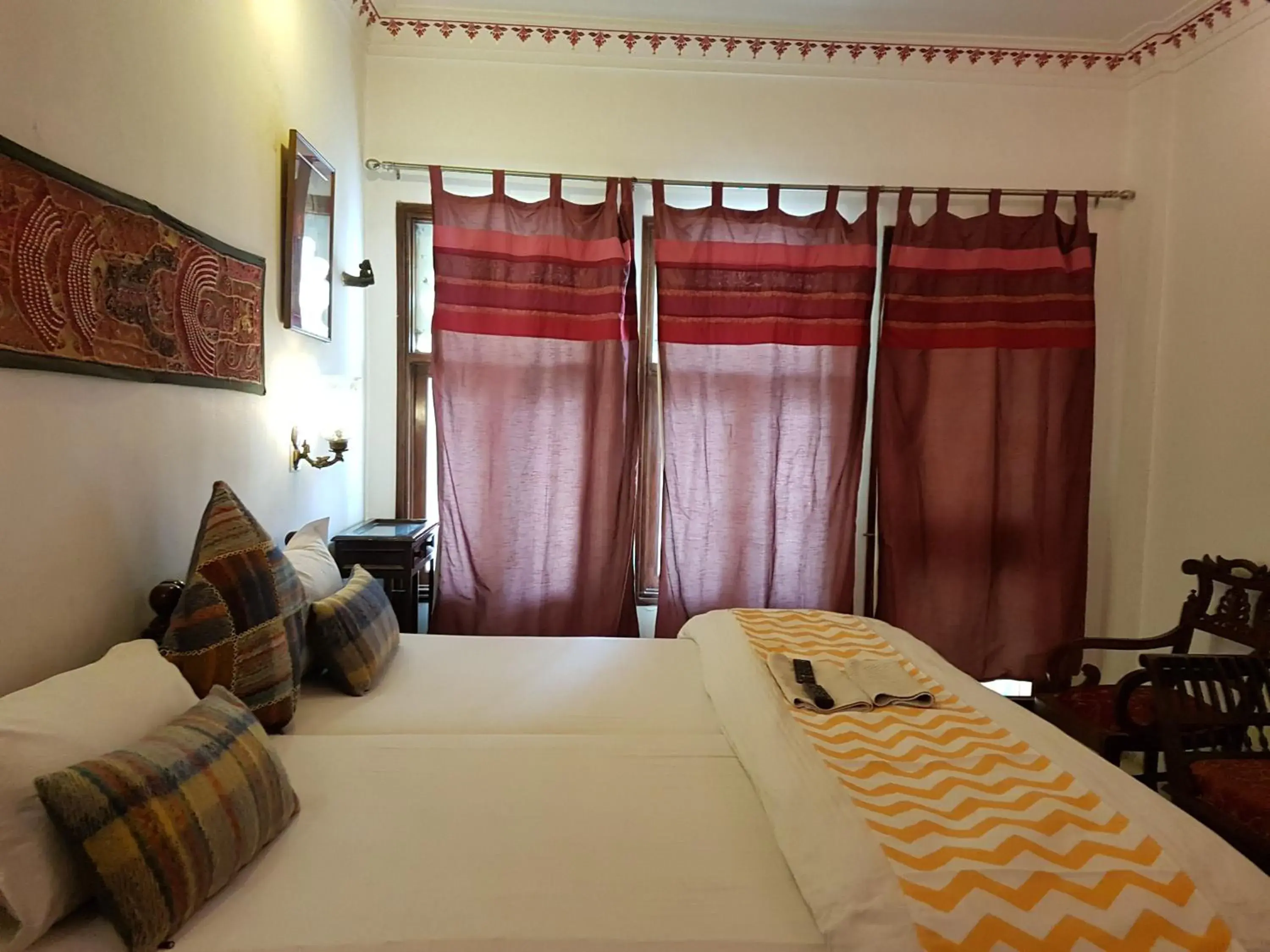 Bedroom, Bed in Hotel Devraj Niwas on Lake Pichola Bedroom, Bed in Hotel Devraj Niwas on Lake Pichola