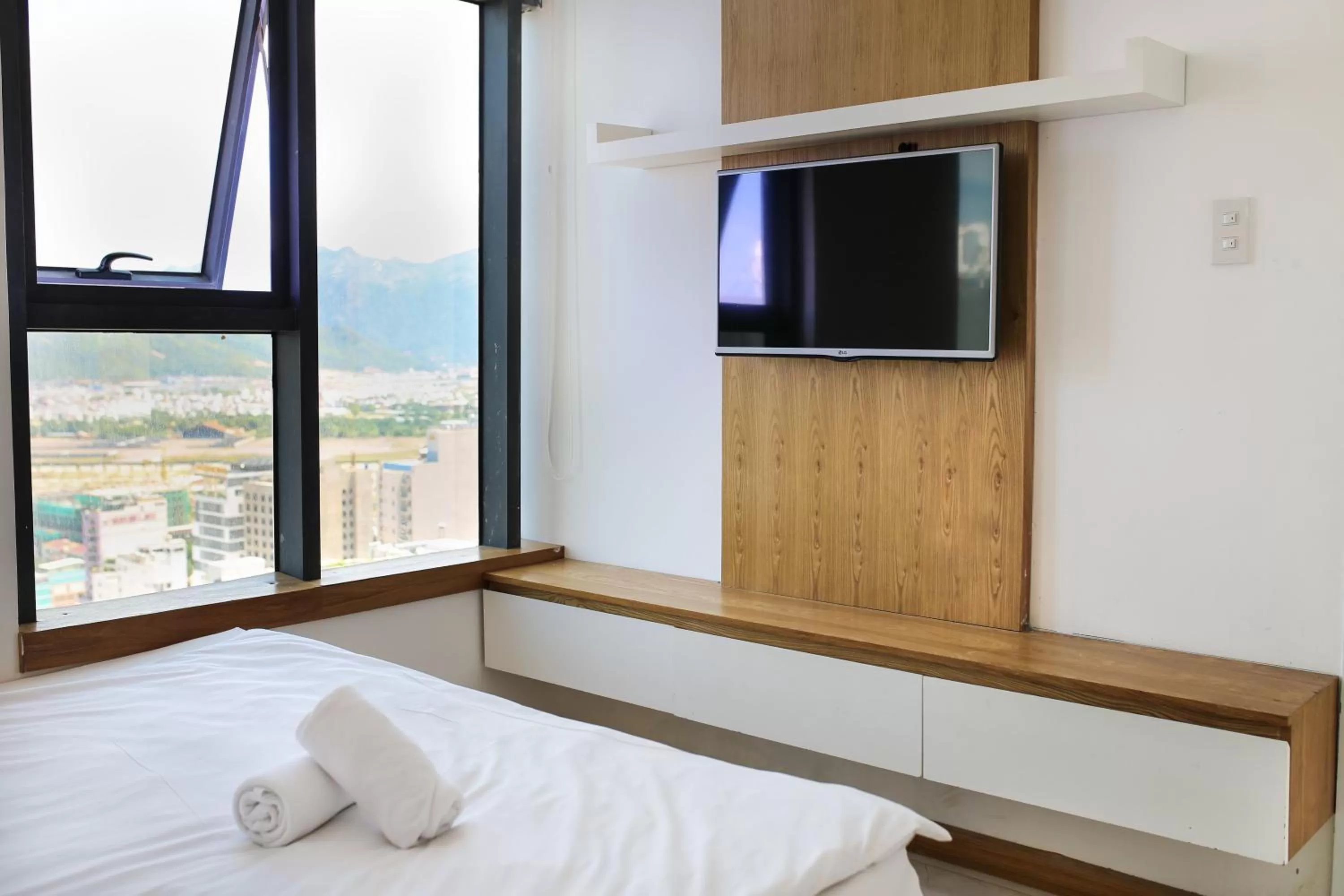 Communal lounge/ TV room, Bed in Gold Ocean Apartment Nha Trang