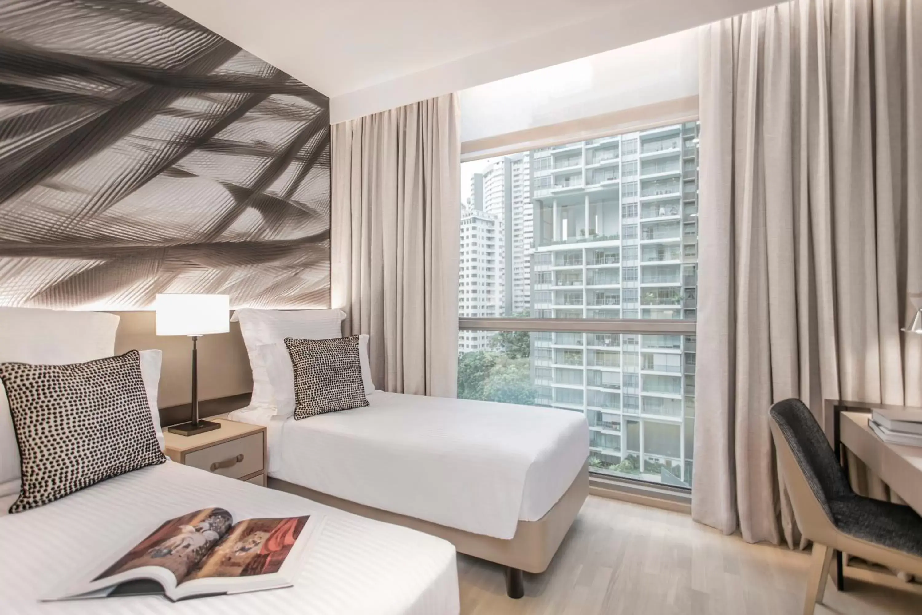 Photo of the whole room, Bed in Ascott Orchard Singapore