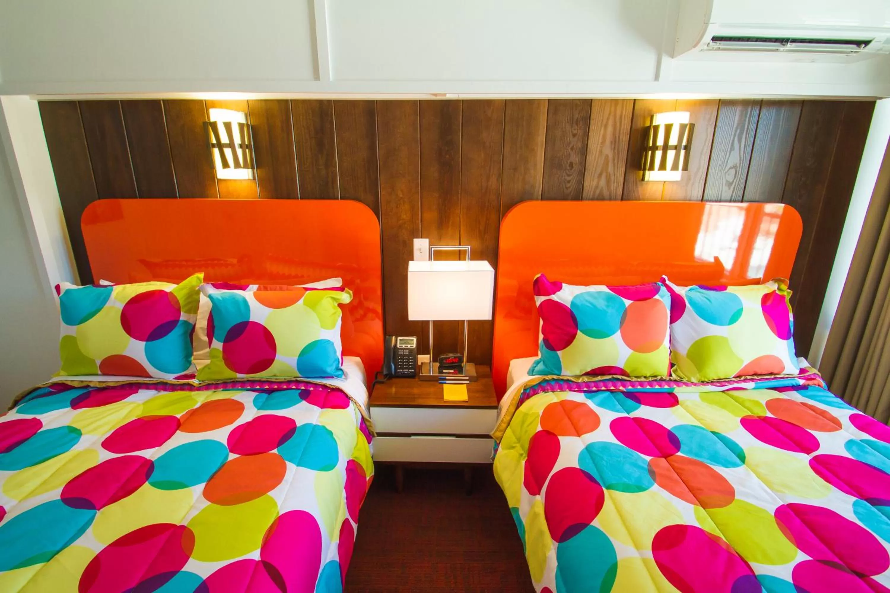 Bed in Mother Earth Motor Lodge