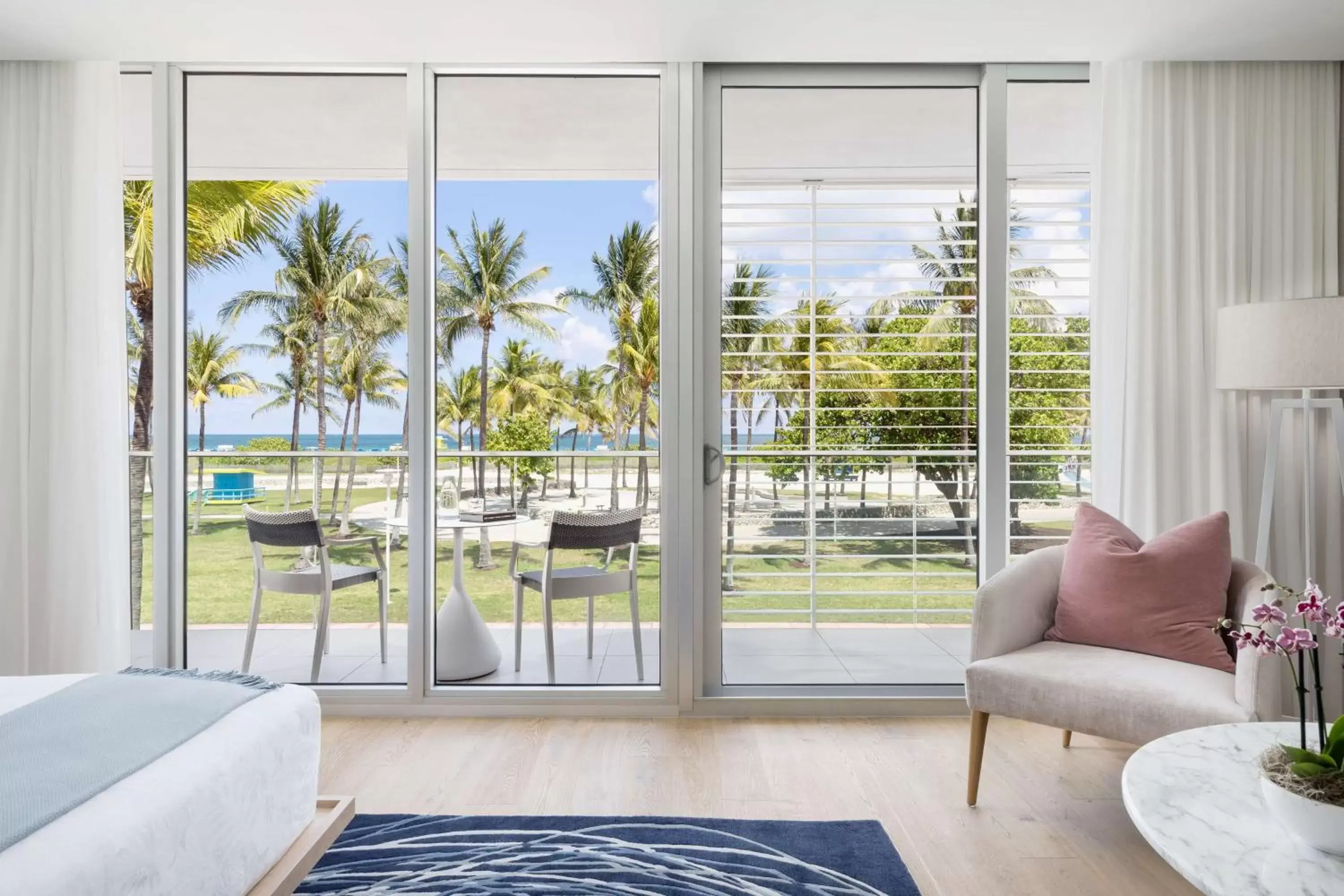 Living room, Pool View in The Gabriel Miami South Beach, Curio Collection by Hilton