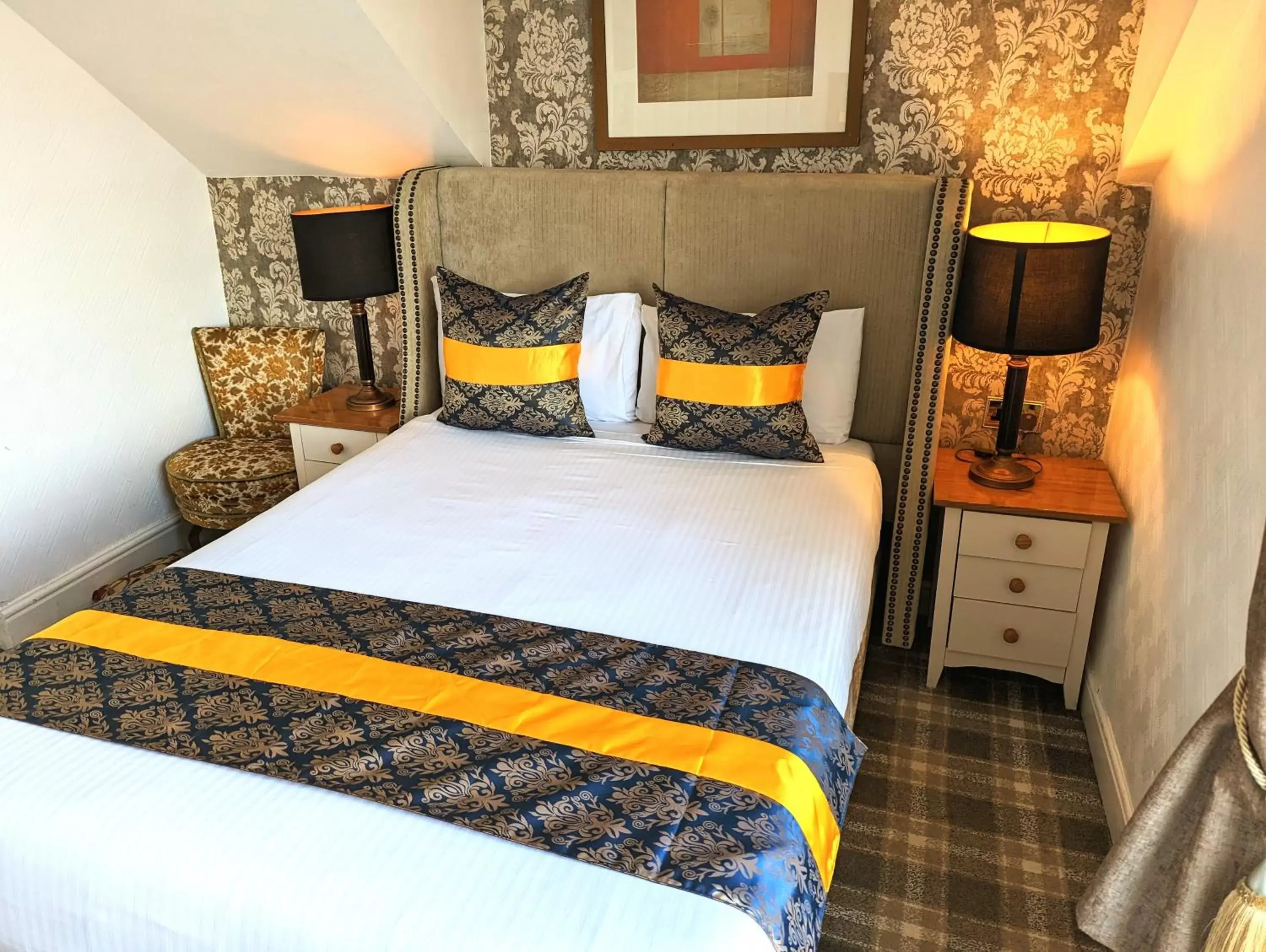 Bed in Brookside Hotel & Restaurant