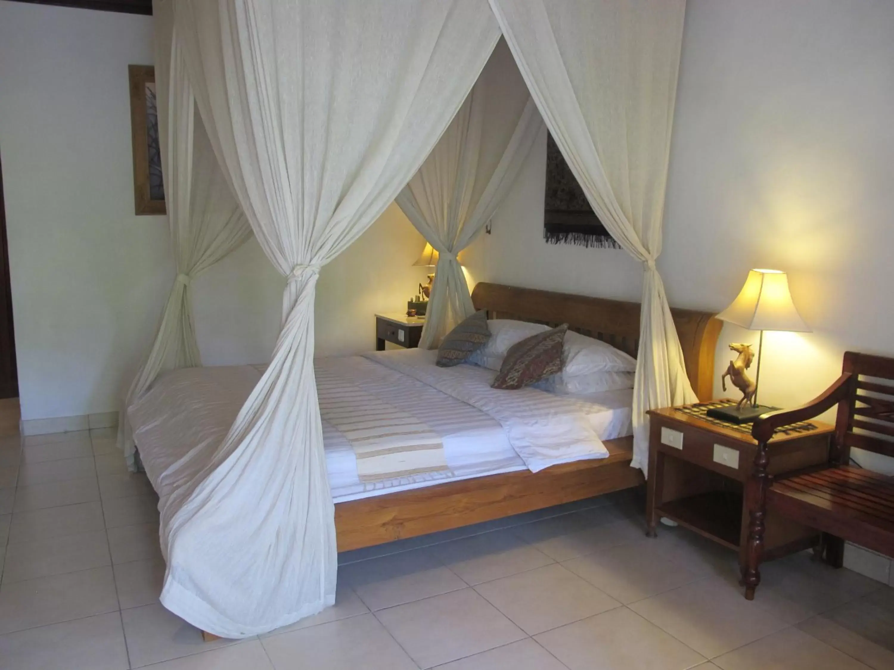 Bed in Bumi Ayu Bungalow Sanur