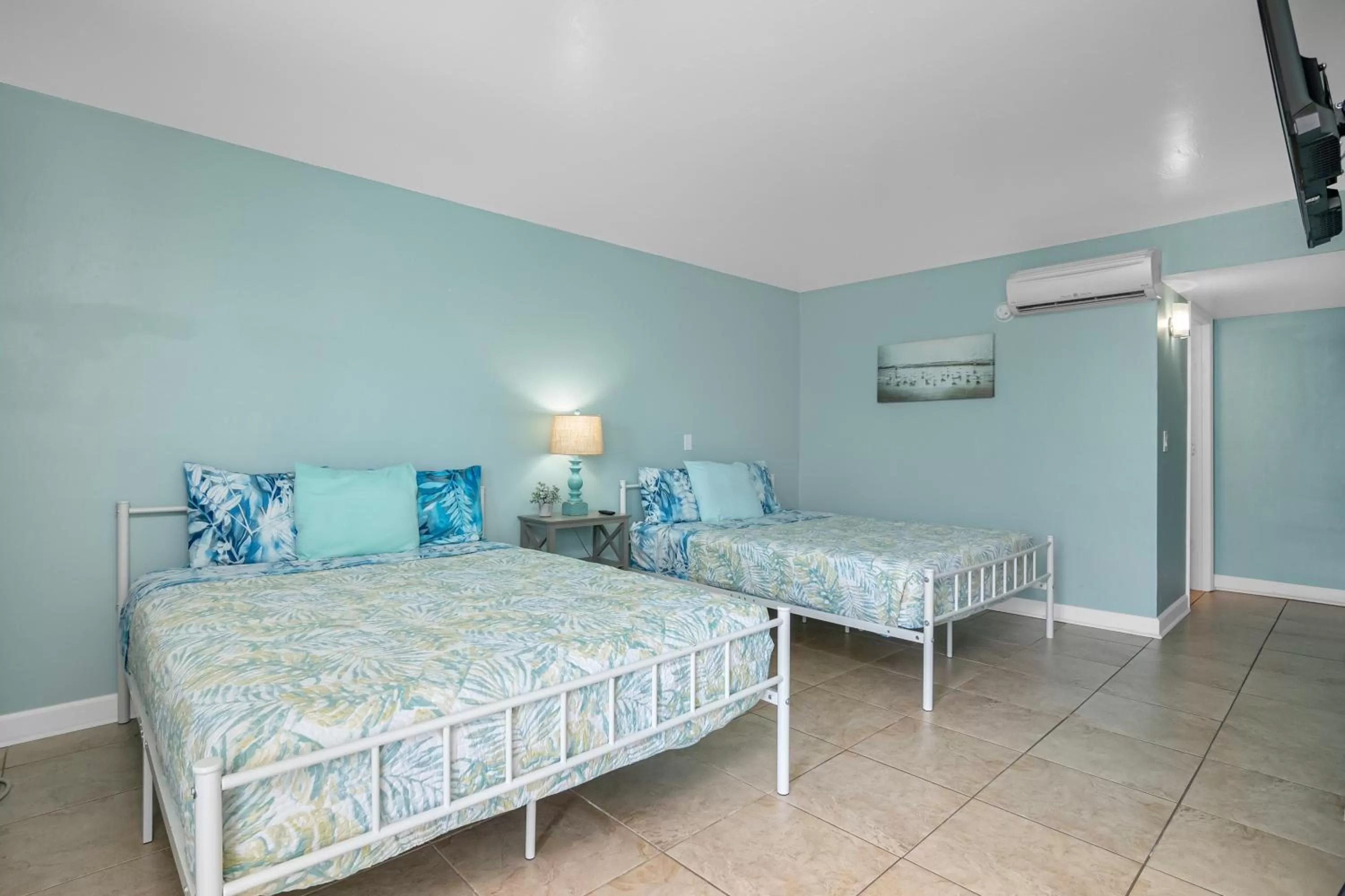 Bed in Latitude 26 Waterfront Resort and Marina