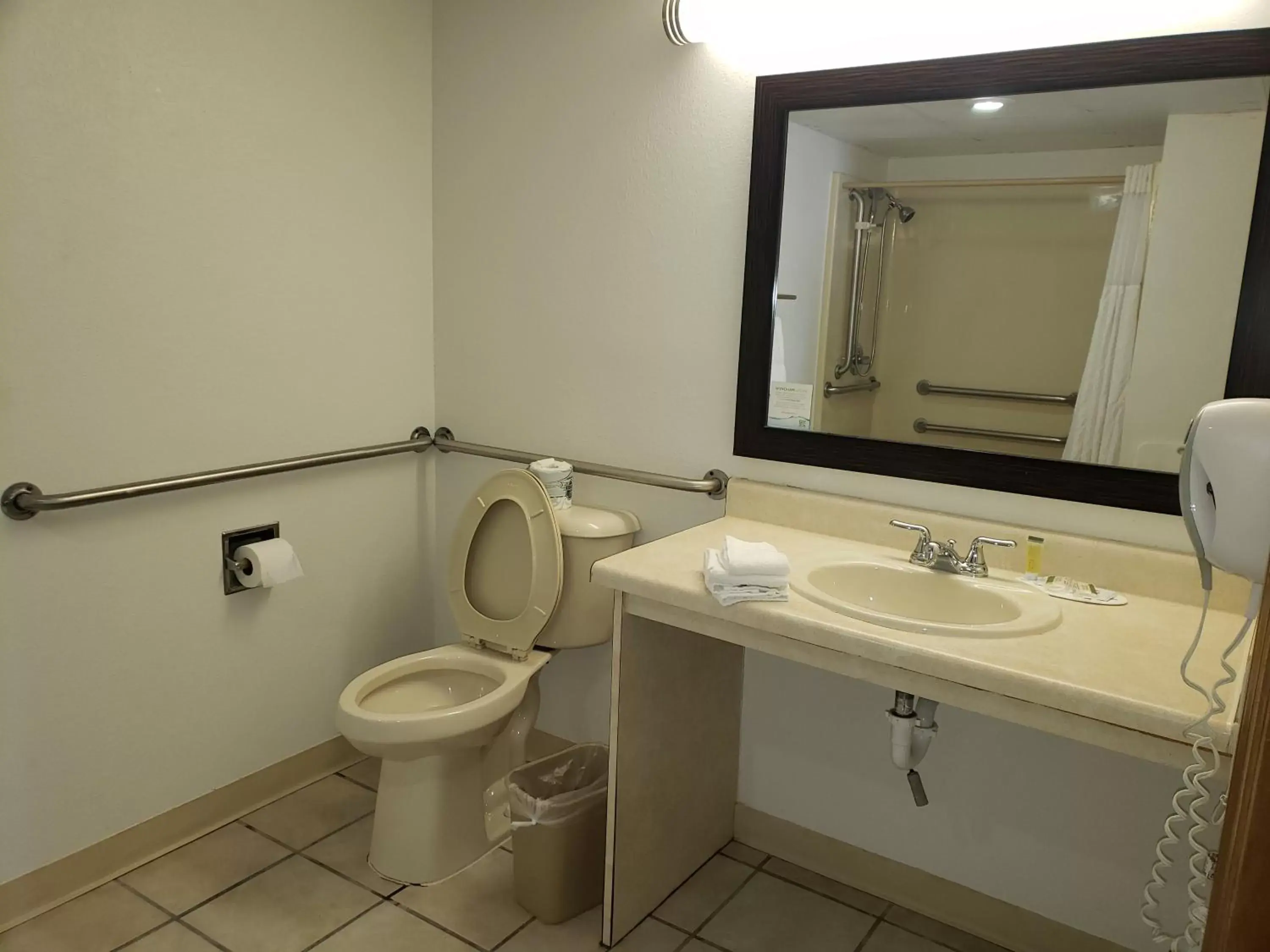 Bathroom in Super 8 by Wyndham Clinton