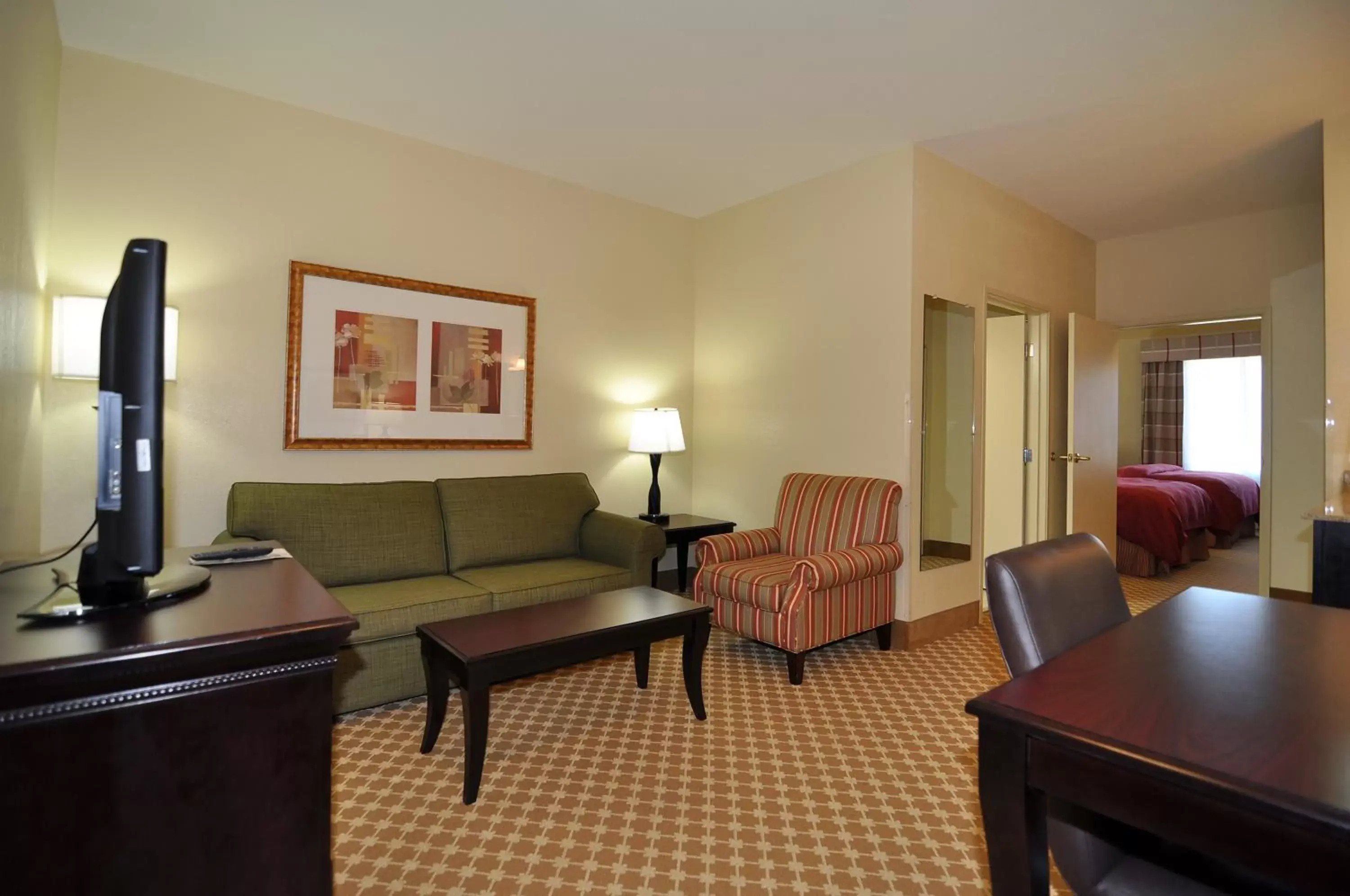 TV and multimedia, Seating Area in Country Inn & Suites by Radisson, Conway, AR