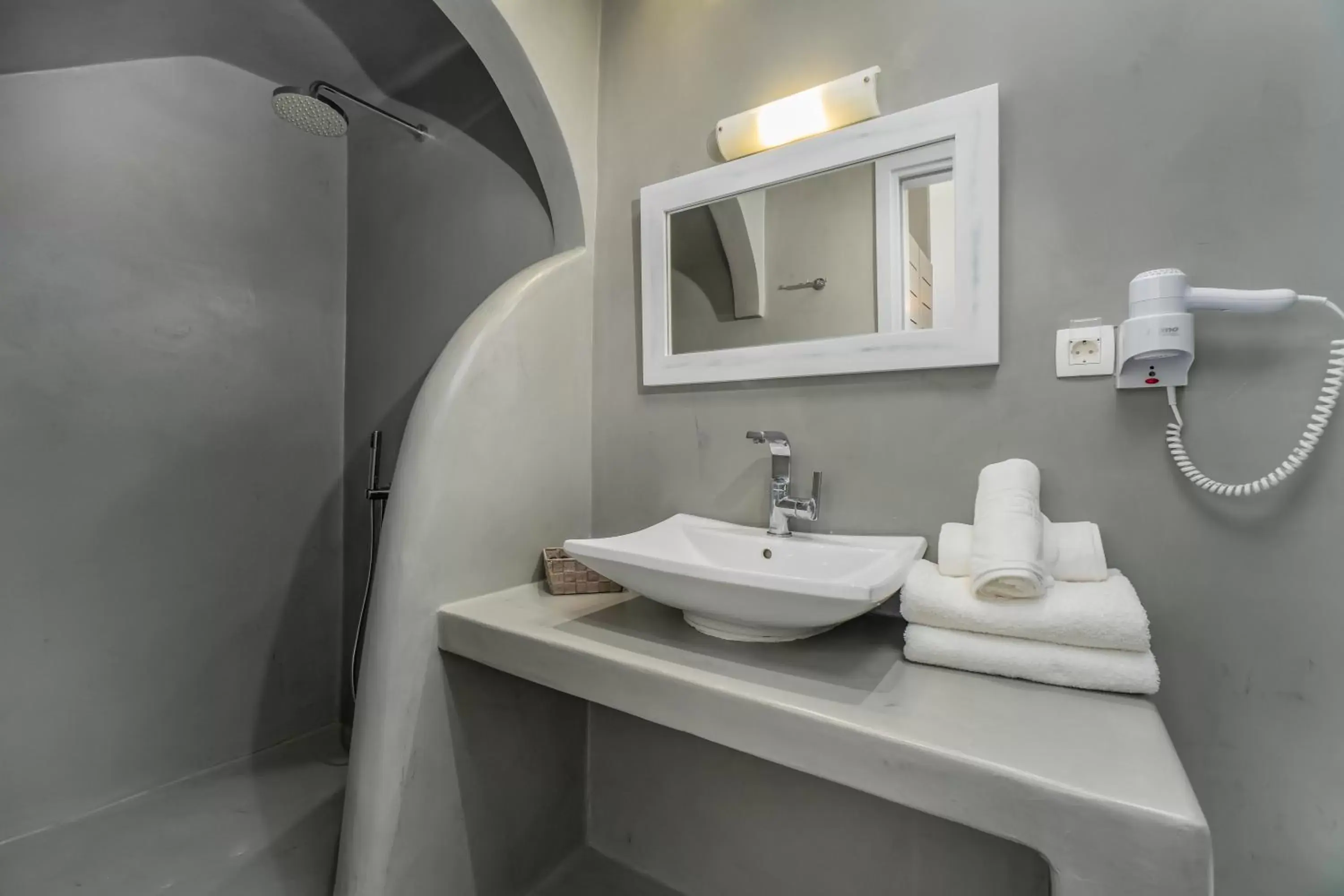 Bathroom in Central Fira Suites