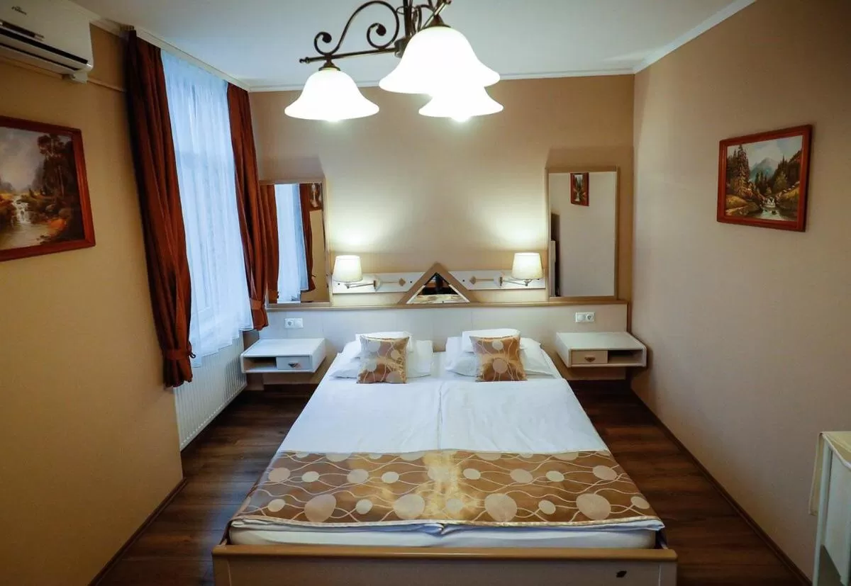 Photo of the whole room, Bed in Gőzmalom Étterem és Panzió