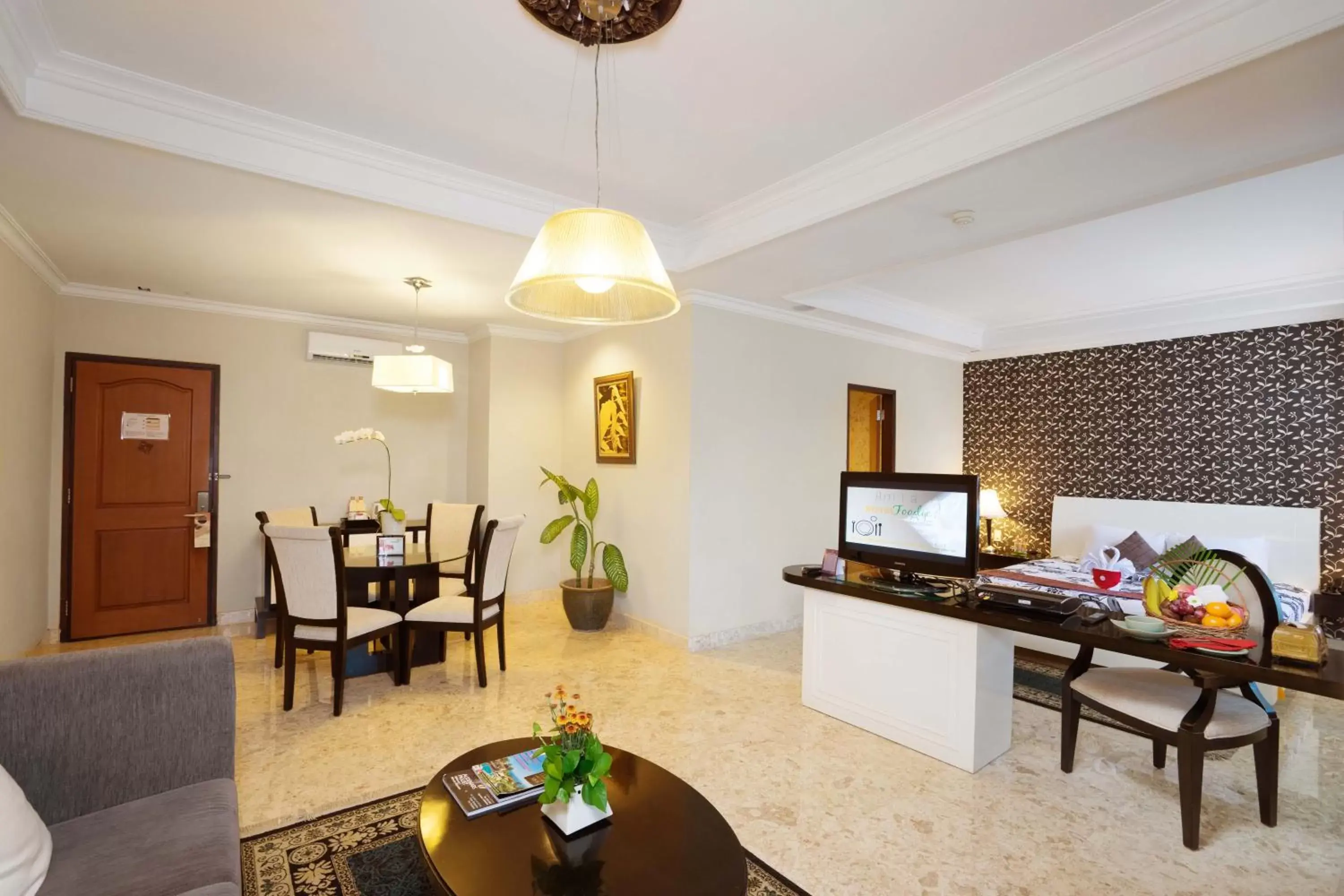 TV and multimedia, Seating Area in Royal Orchids Garden Hotel & Condominium