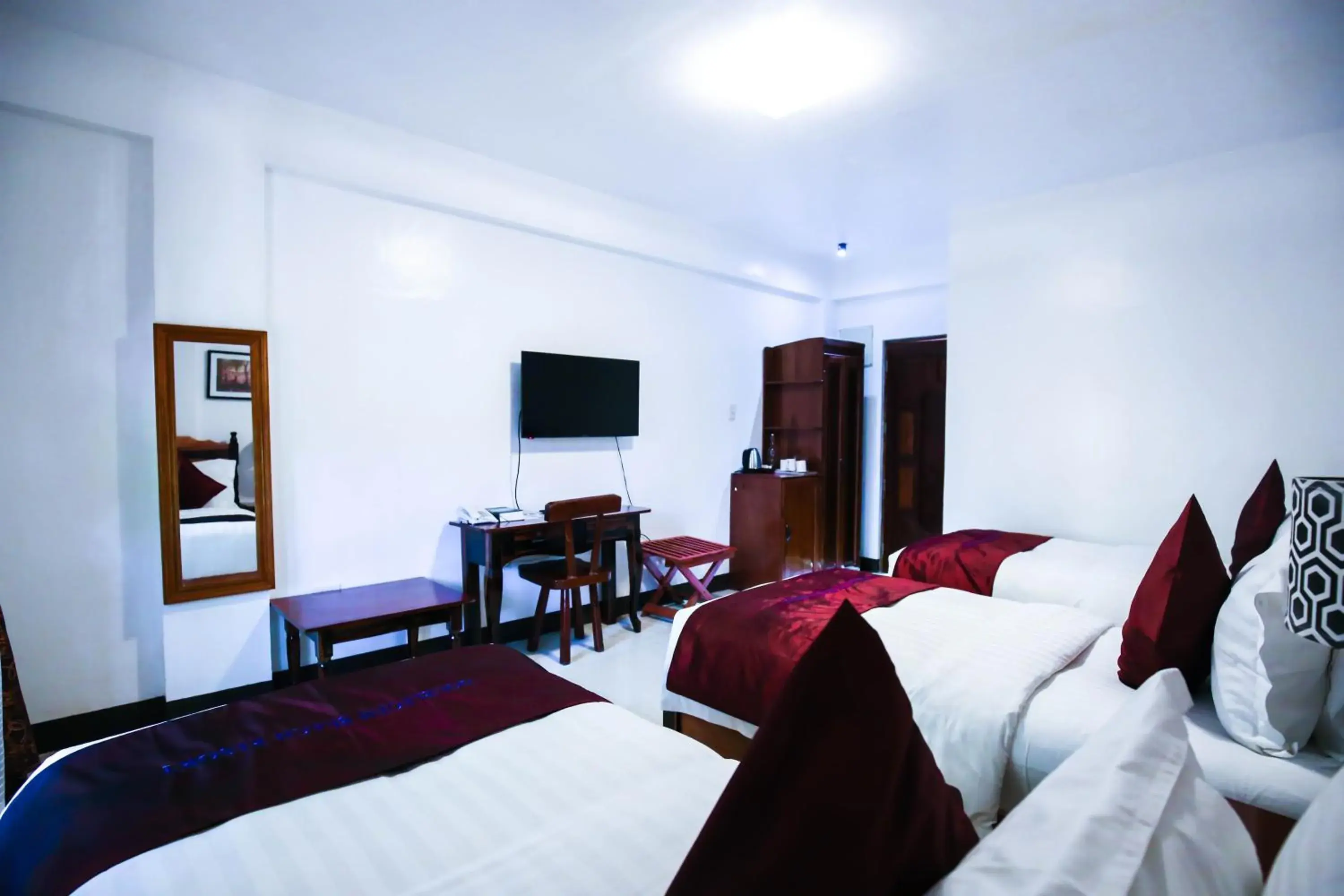 Bed in Doublegem Beach Resort and Hotel