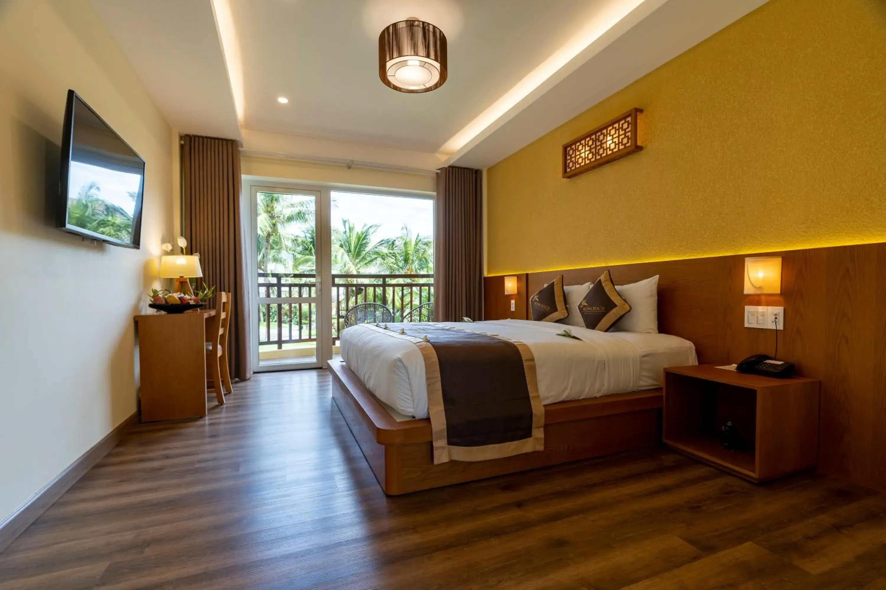 Bed in Aroma Beach Resort and Spa