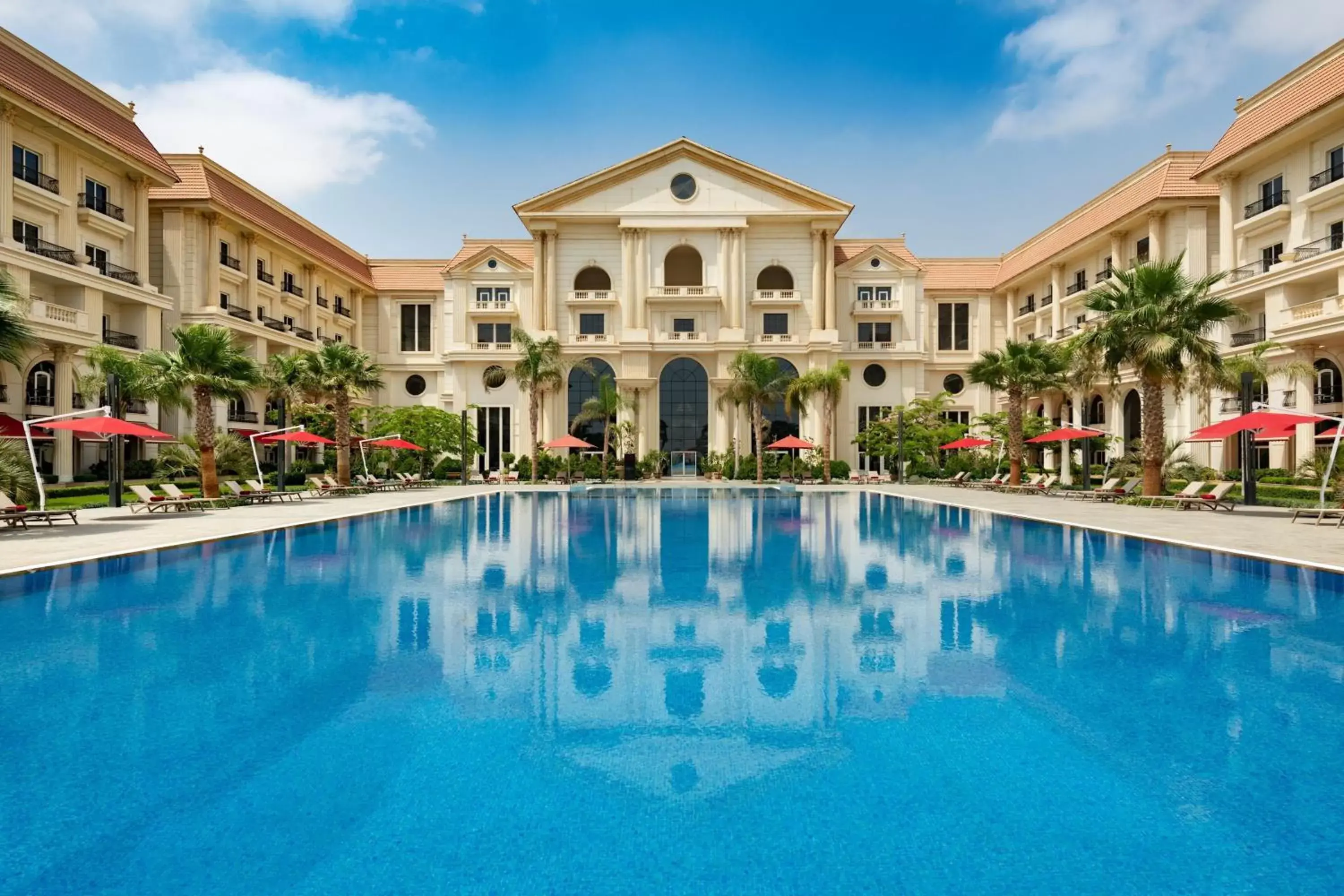 Swimming pool, Property Building in The St. Regis Almasa Hotel, Cairo