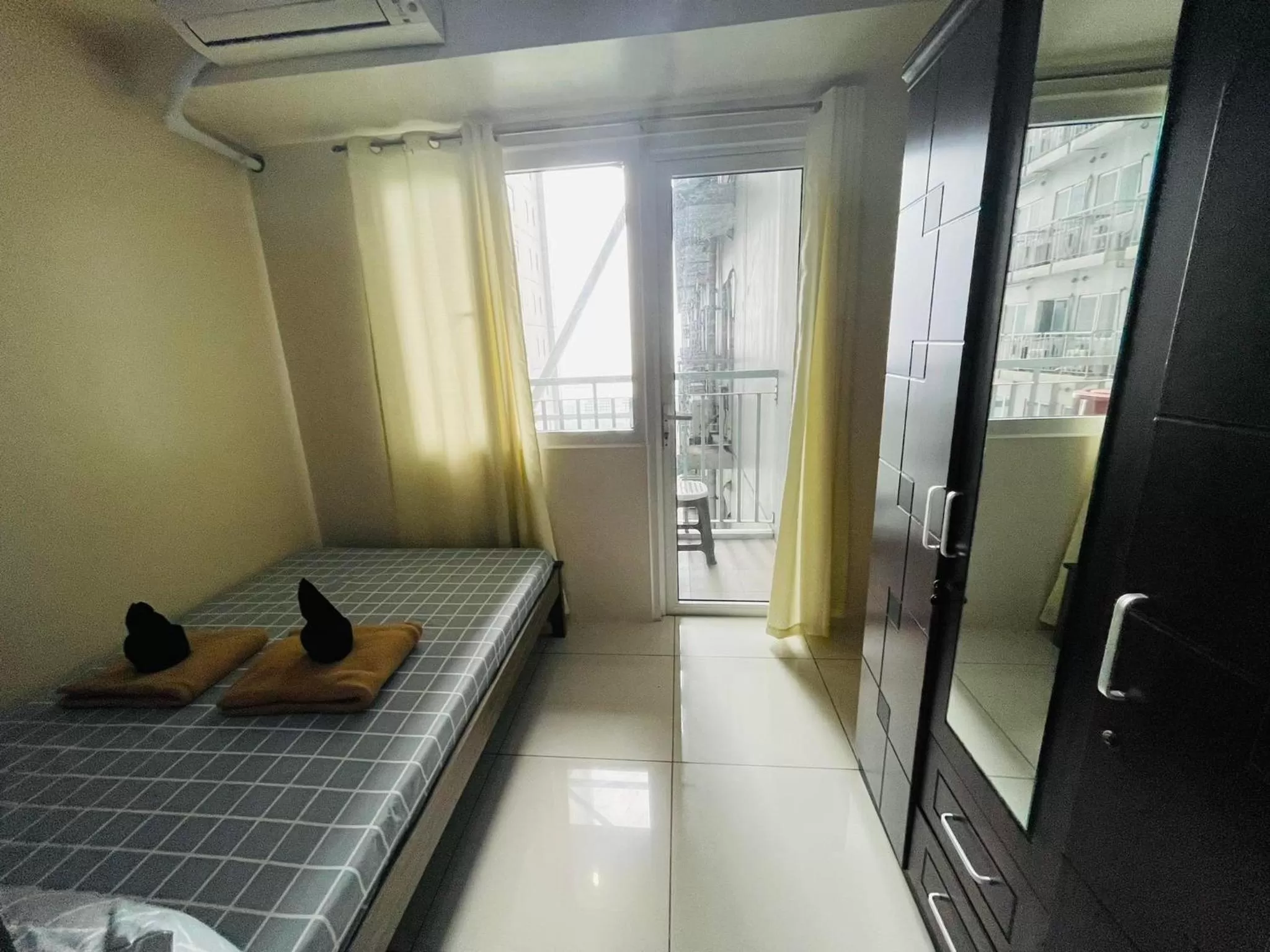 Bedroom in Green Residences Staycation by PBYY