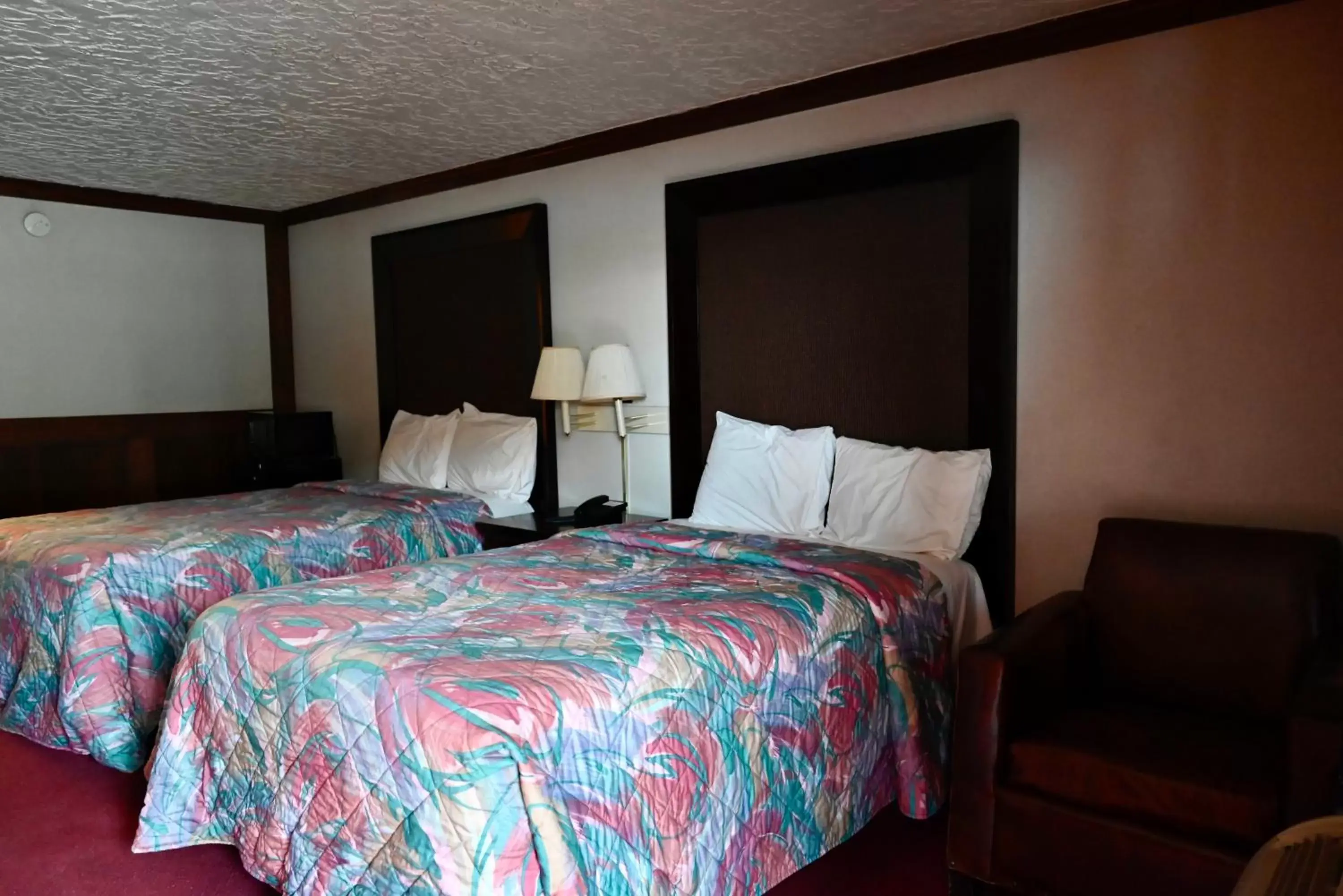 Bed in Rittiman Inn and Suites