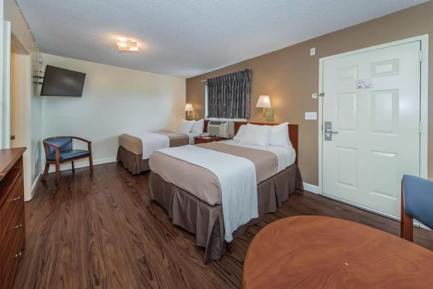 Bed in Tampa Bay Extended Stay Hotel