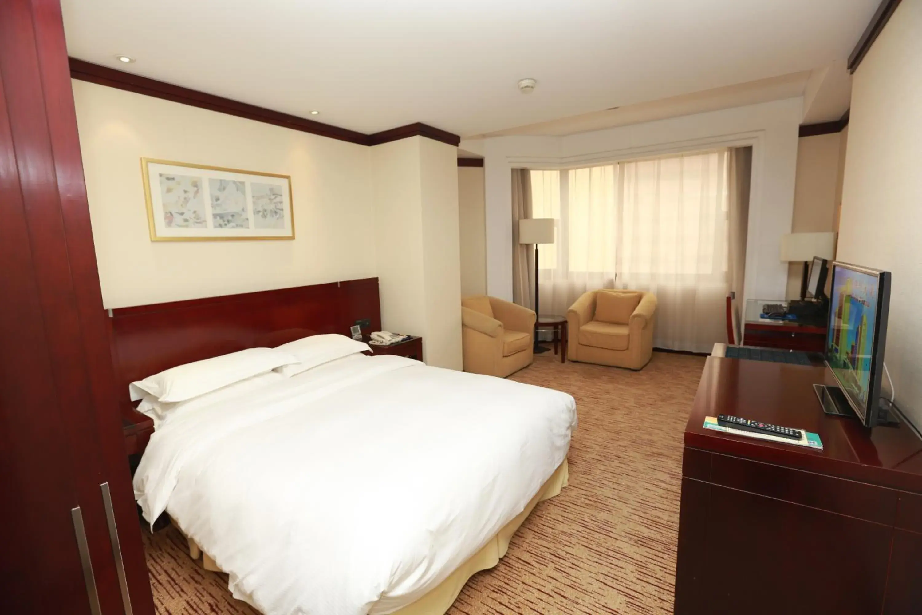 Bedroom in Poly Plaza Hotel