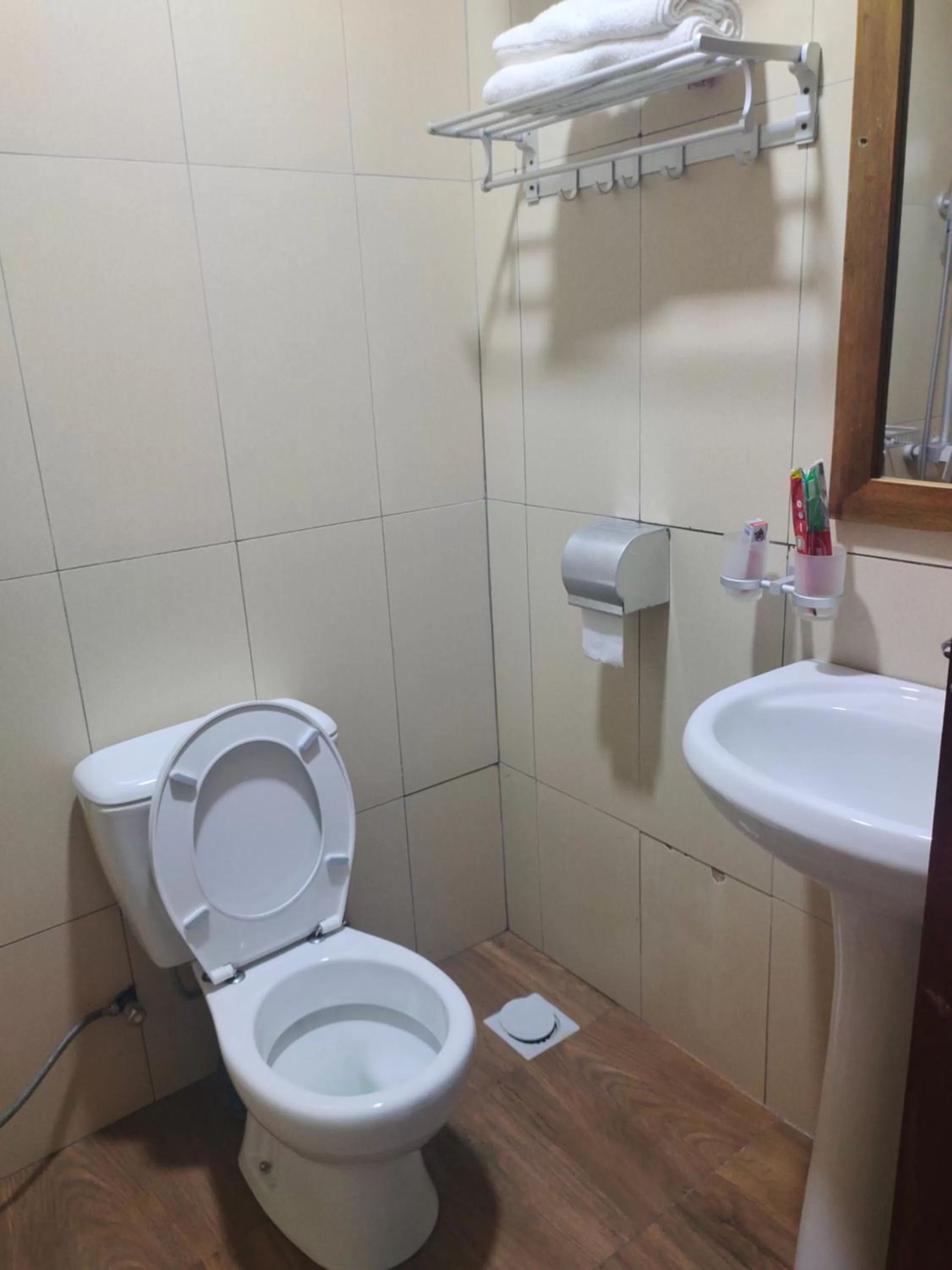 Toilet, Bathroom in Serene Beach Resort