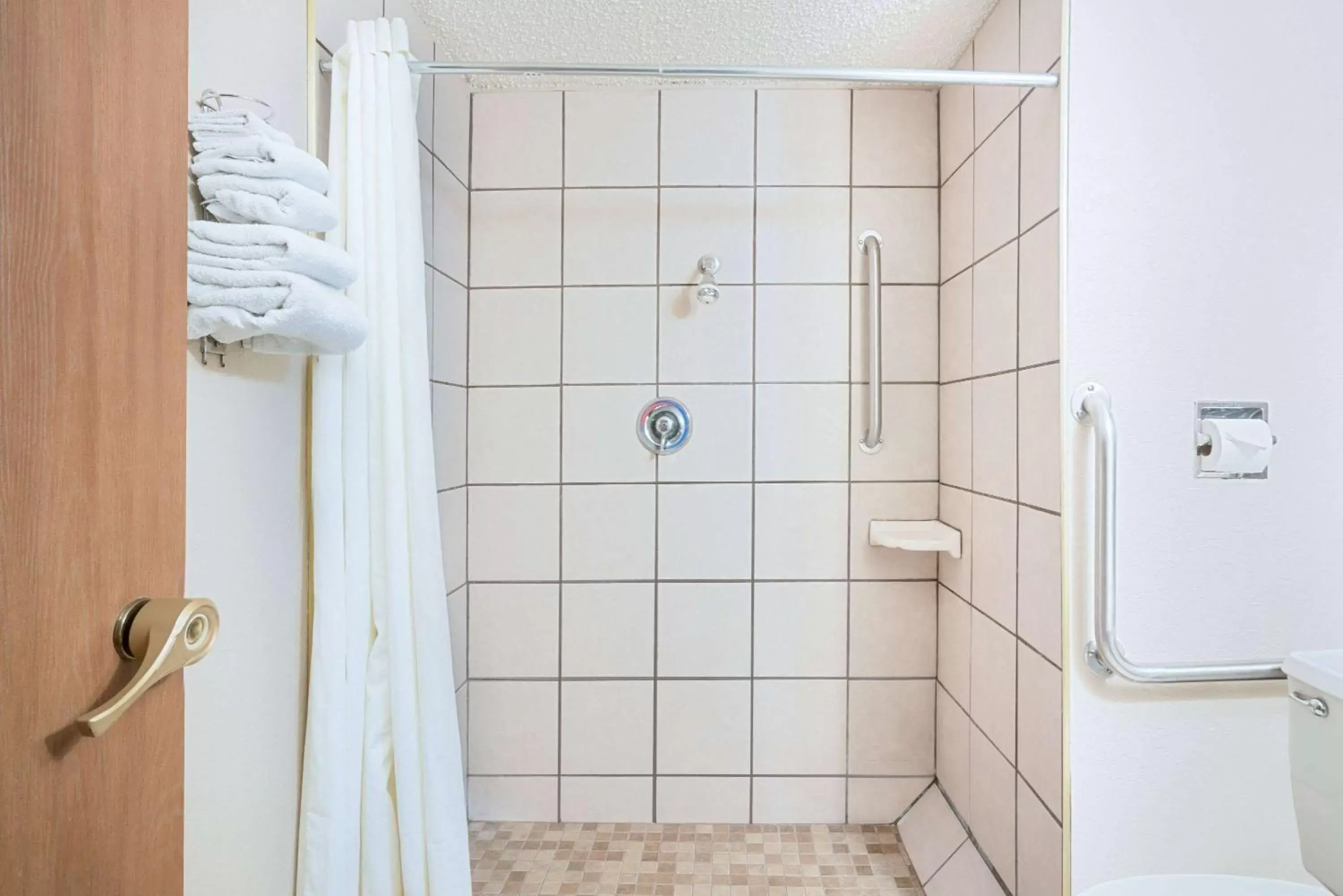 Shower, Bathroom in Super 8 by Wyndham Marshall MN