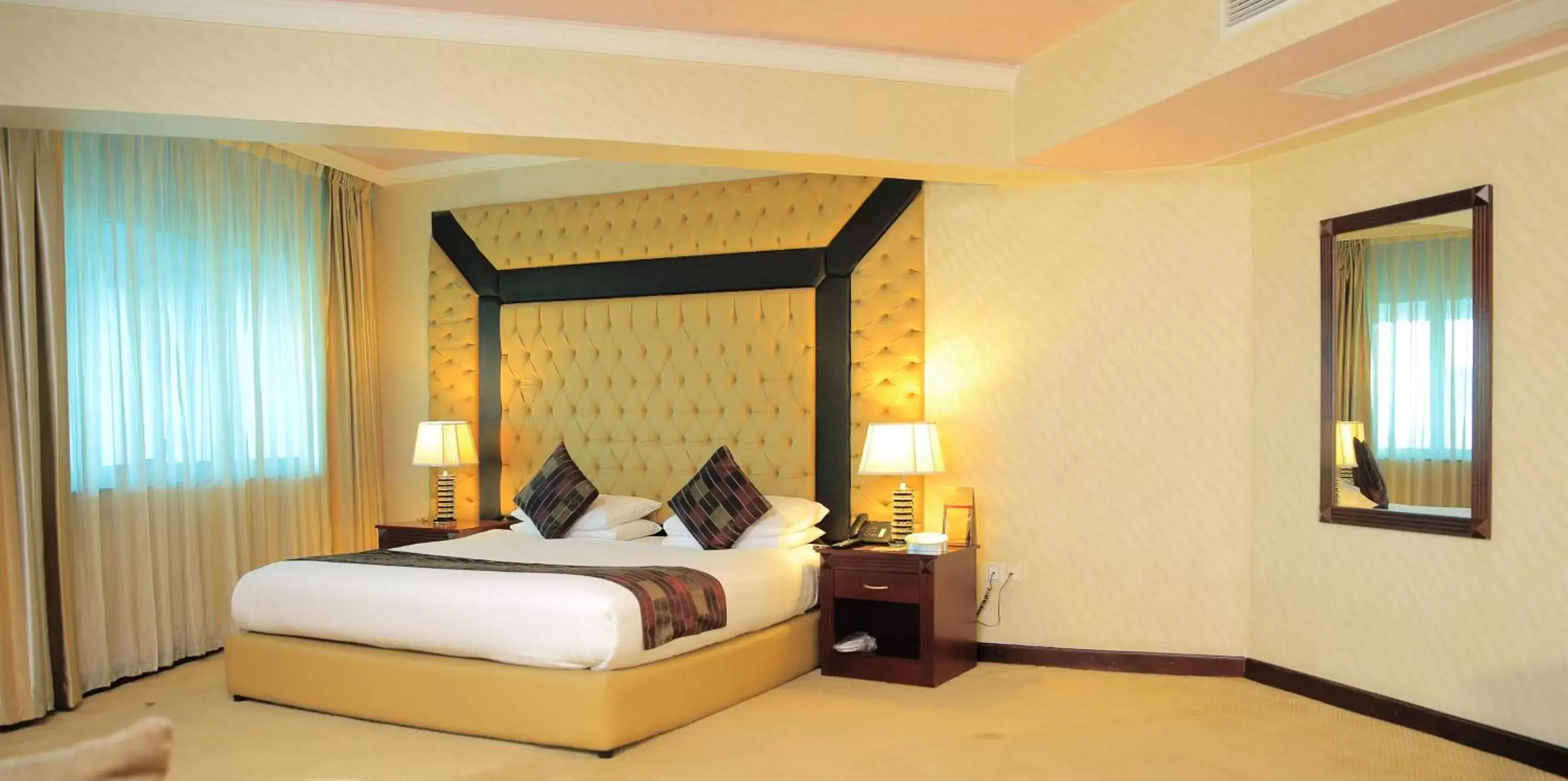Bed in Inter Luxury Hotel