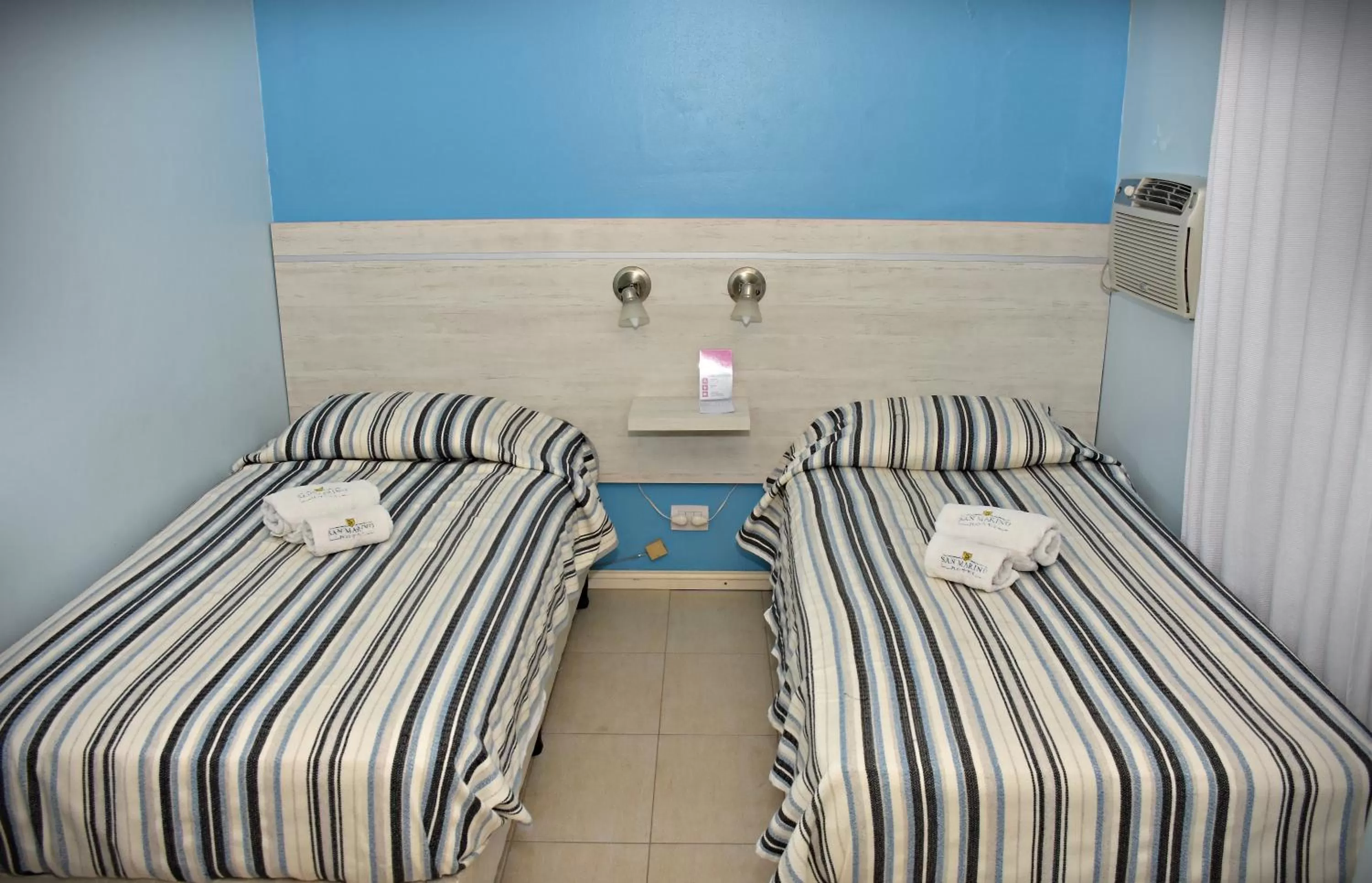 Bed in Hotel San Marino