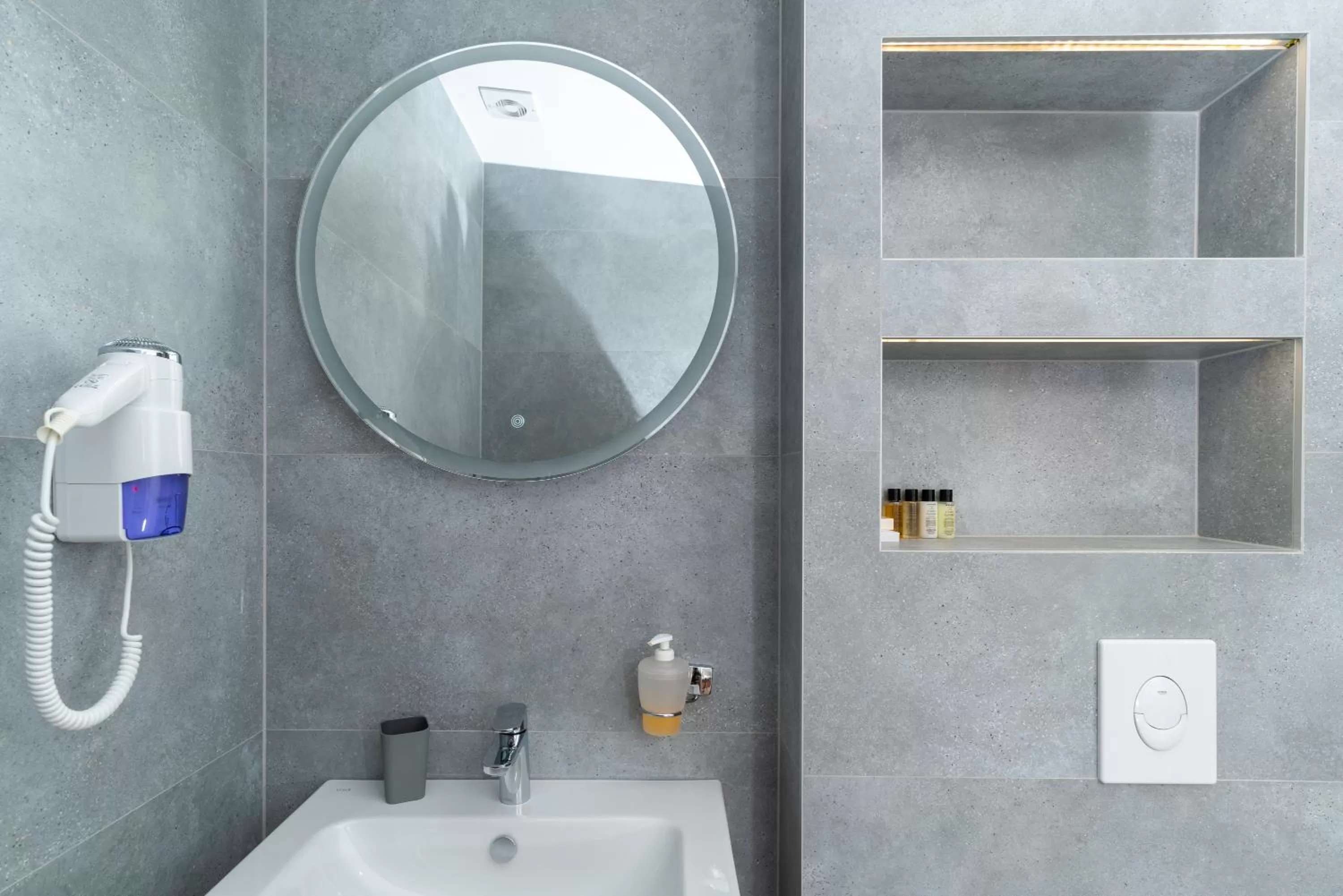 Bathroom in Ornament Hotel and Apartments