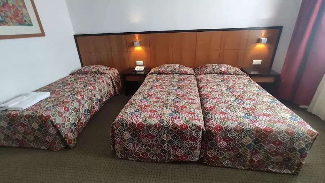 Bed in Hotel Bagoeira