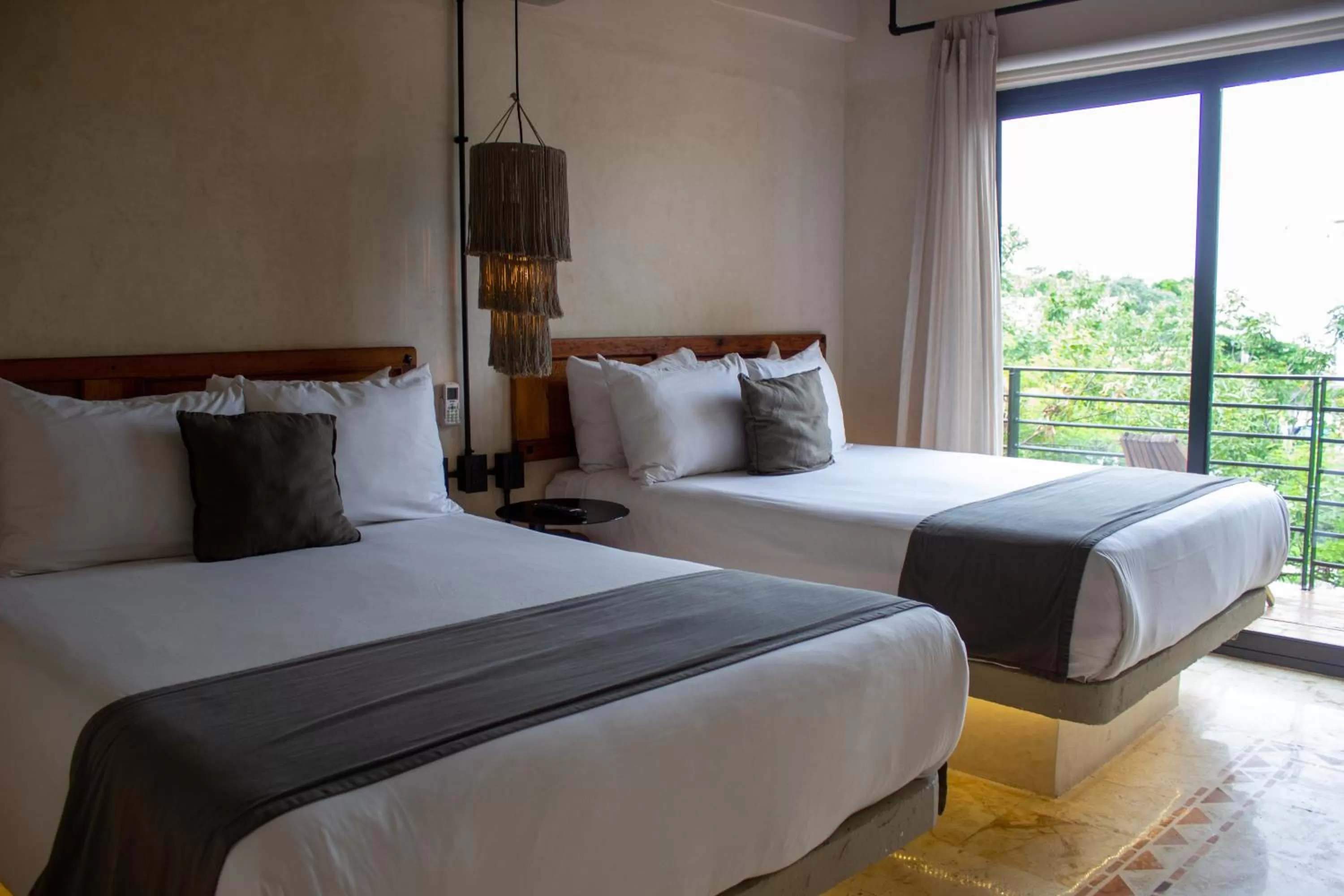 Bed in Caribbean Paradise Hotel & Spa - 5th Avenue