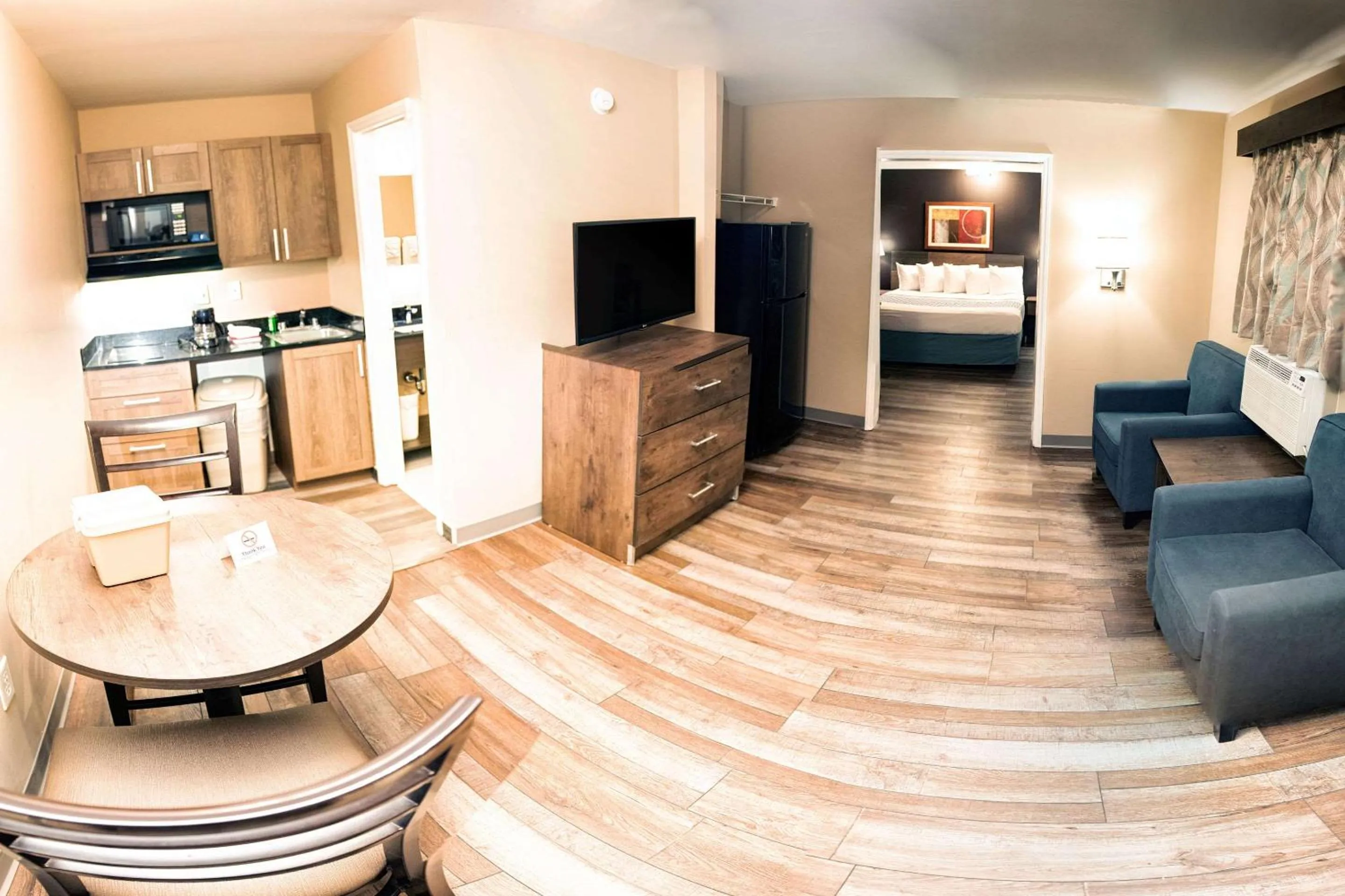 Bedroom, Seating Area in Suburban Studios Charlotte-Ballantyne