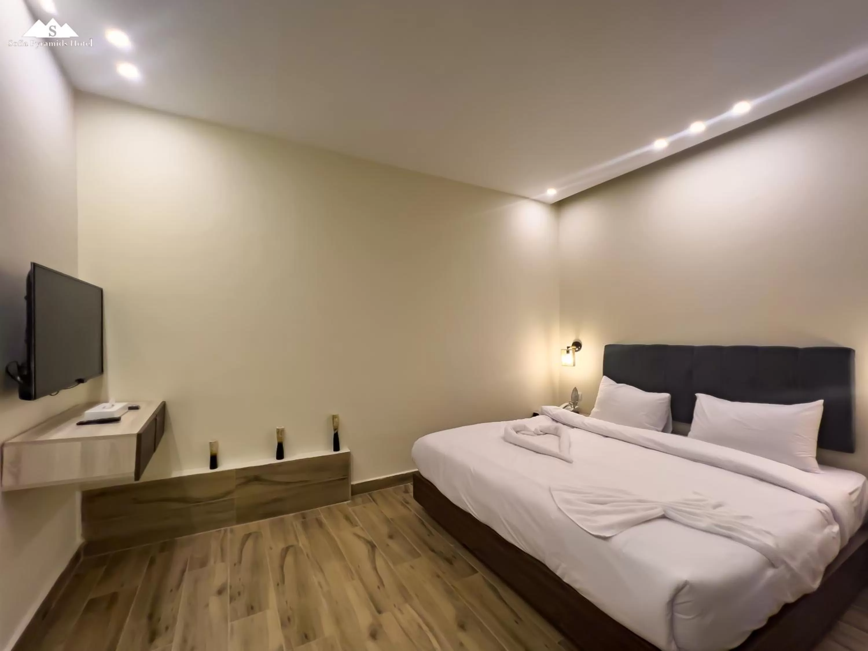 Bed in Sofia Pyramids Hotel