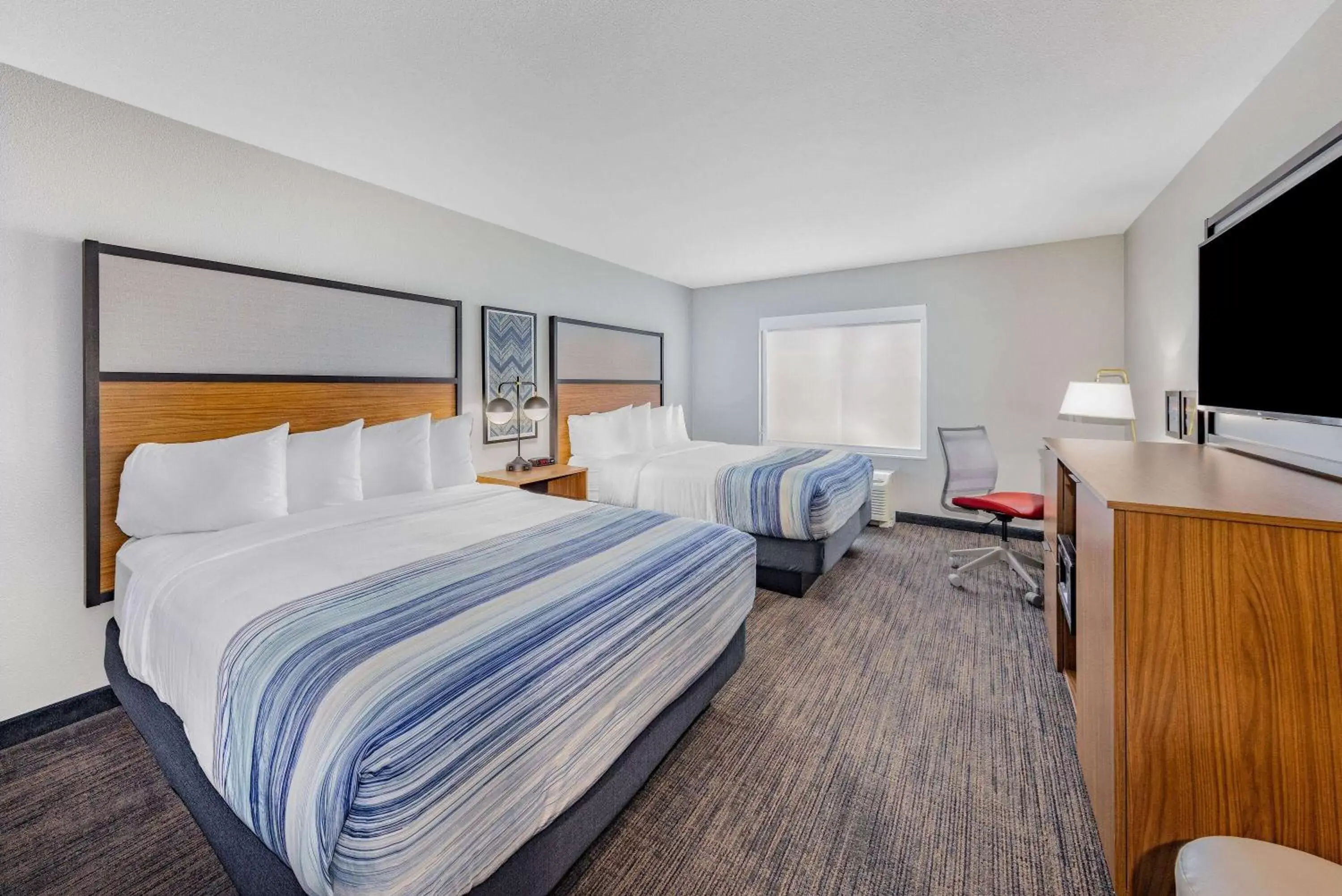 Photo of the whole room, Bed in AmericInn by Wyndham International Falls