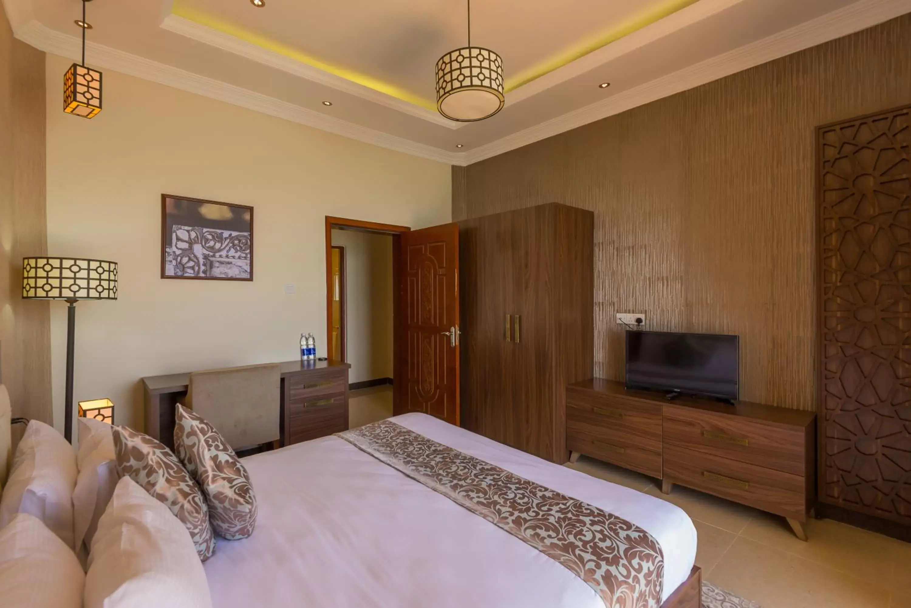 Photo of the whole room, TV/Entertainment Center in Golden Tulip Zanzibar Resort