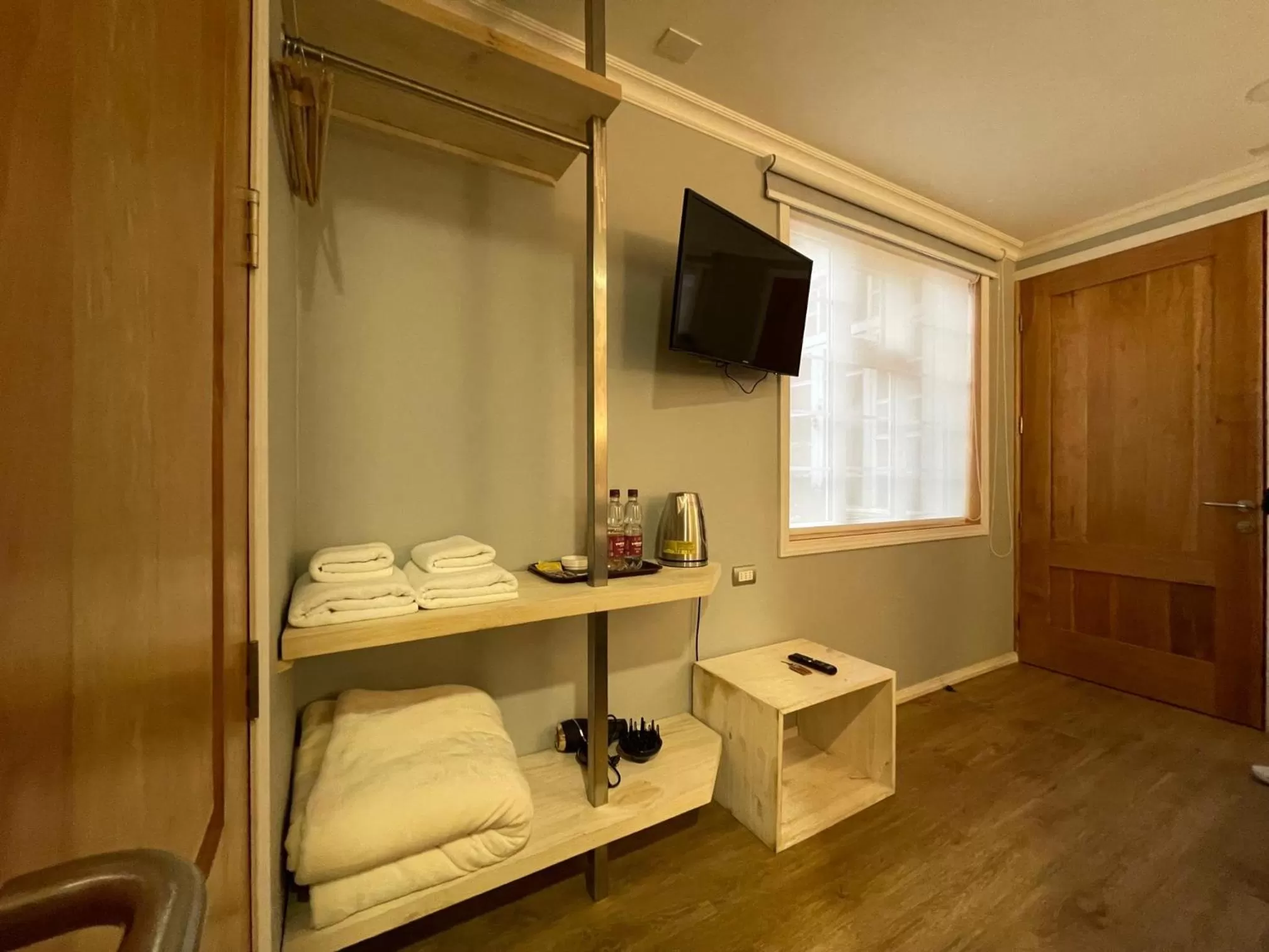 TV/Entertainment Center in Hostal Boutique Puerta Roja