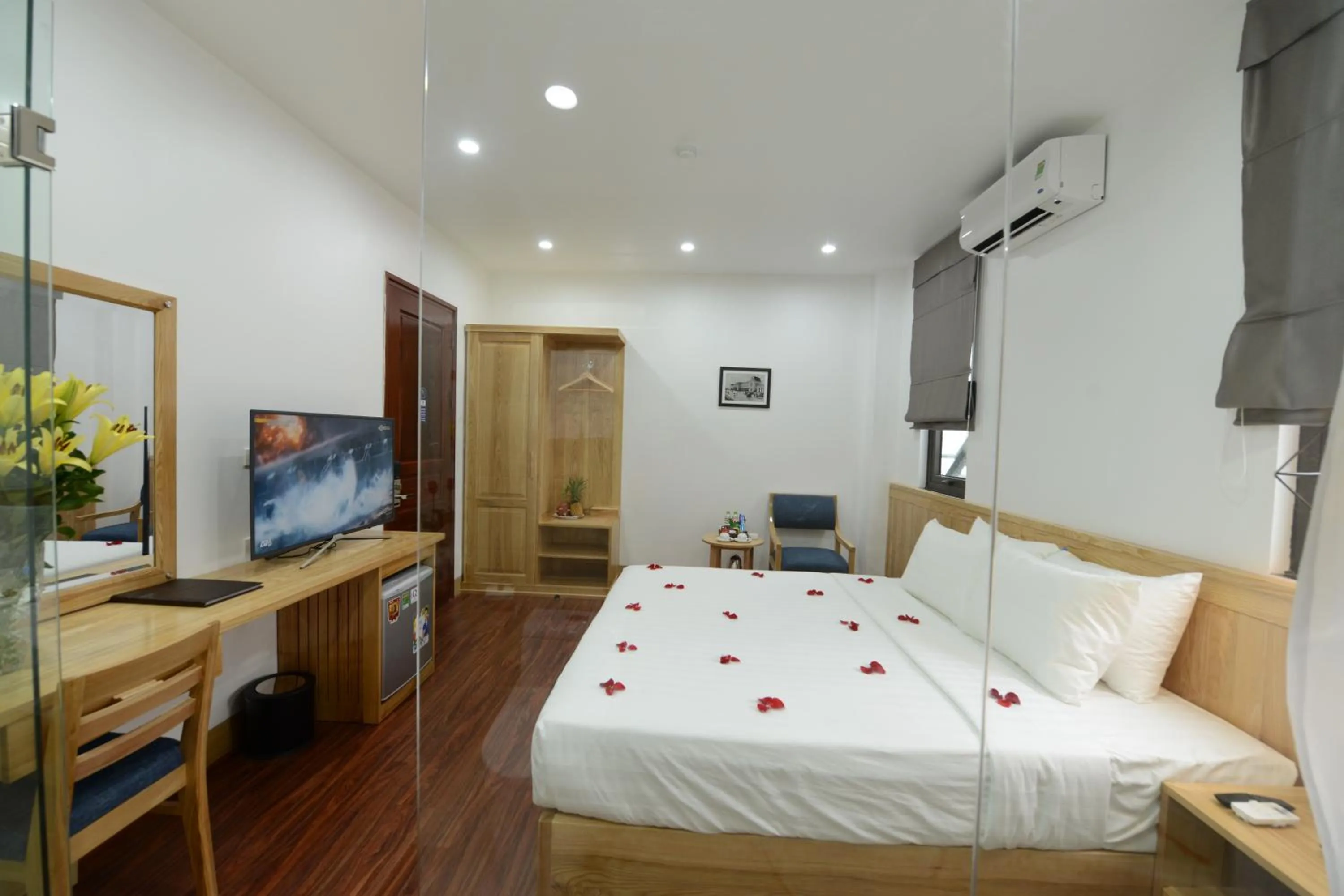 Bed in Blue Hanoi Inn City Hotel