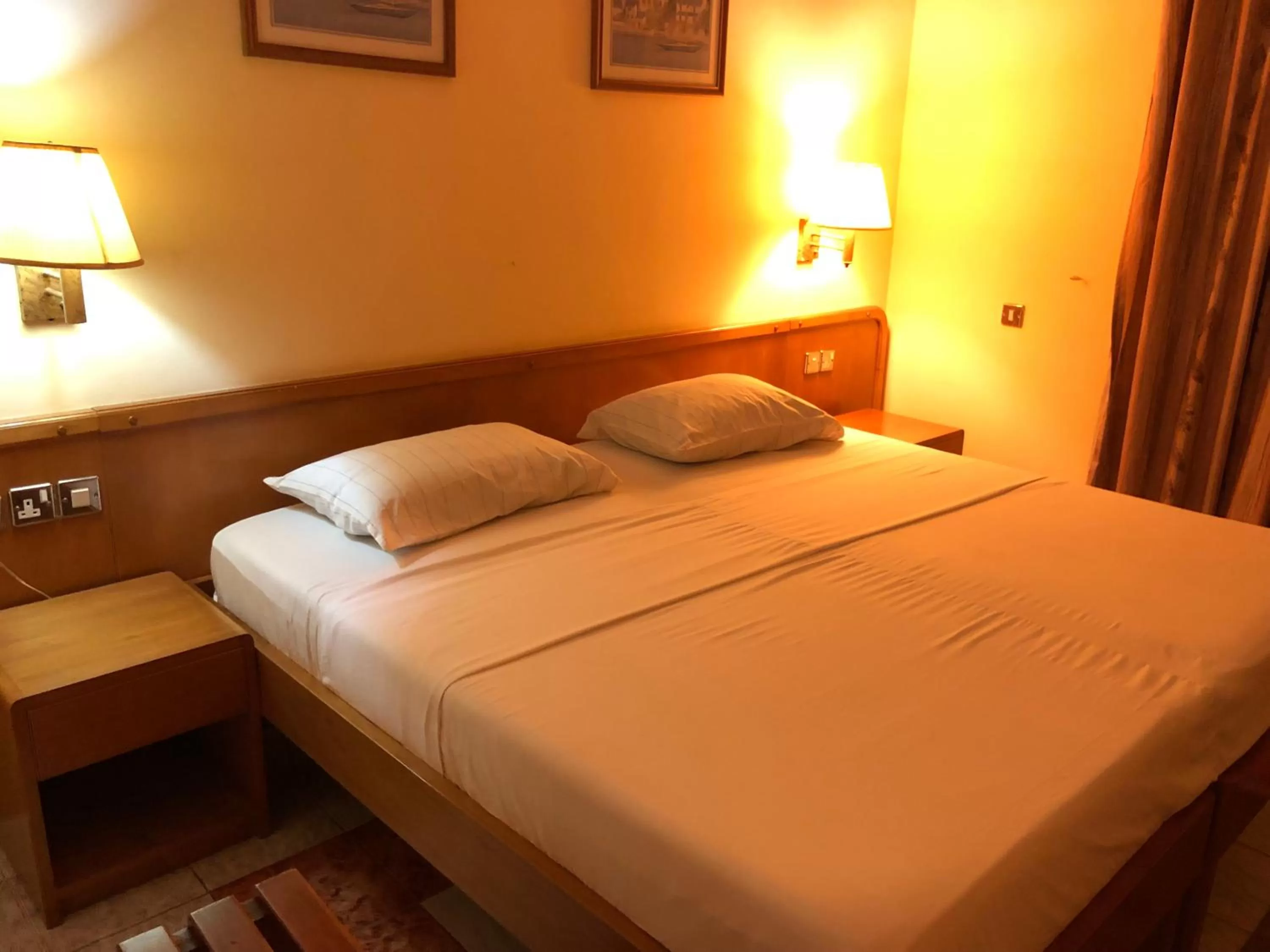 Bed in Maple Leaf Korean Hotel